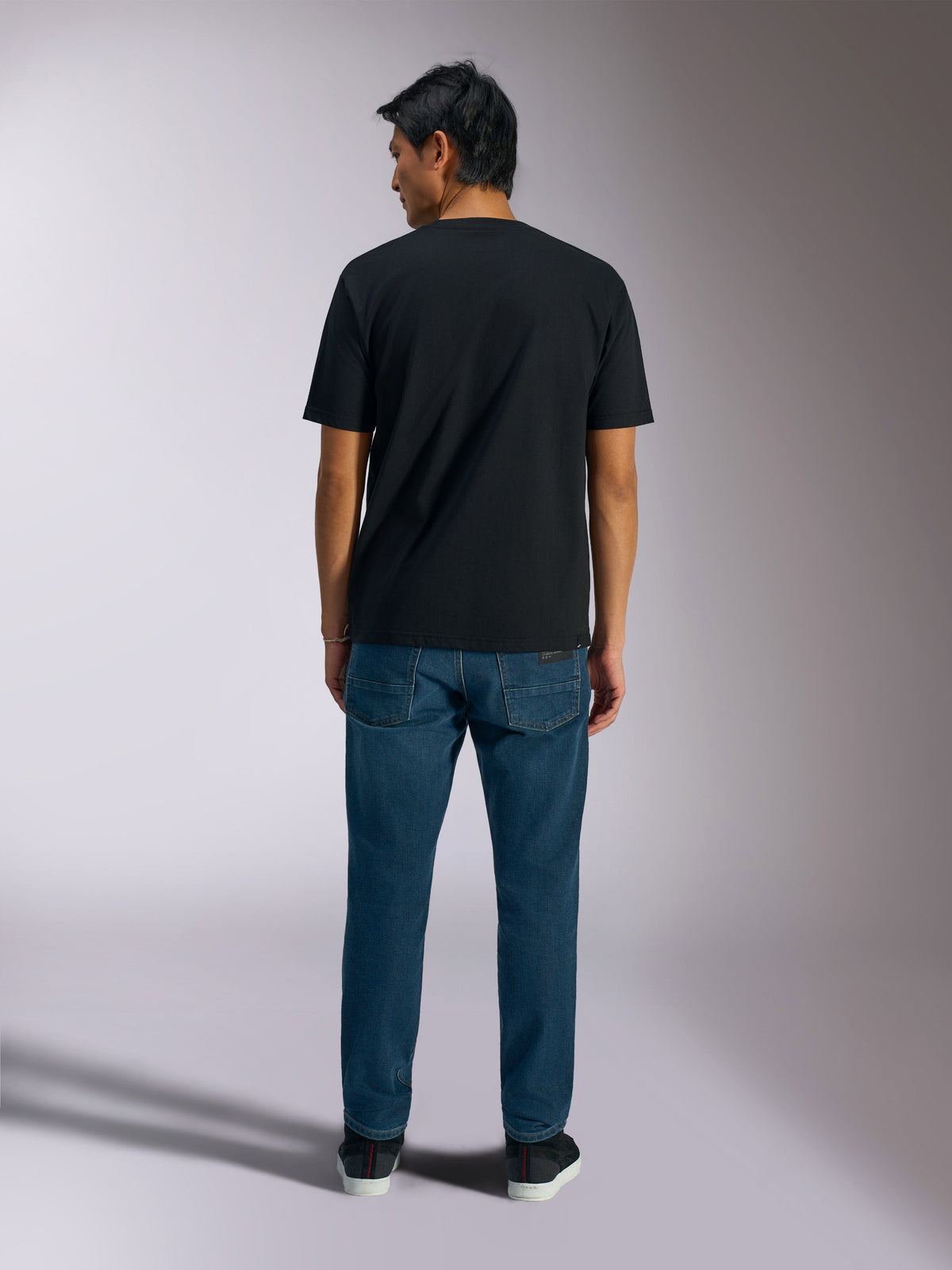 Alpinestars Ageless Shadow CSF Tee, Short Sleeve T-Shirt, Black, back view, worn with blue jeans, casual motorsport streetwear