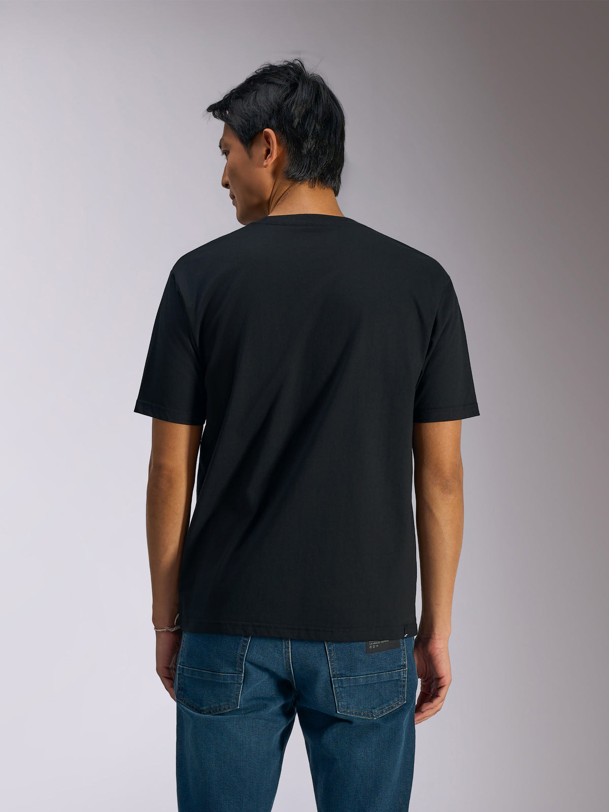 Alpinestars Ageless Shadow CSF Tee, Short Sleeve T-Shirt, Black, Back View on Model, Plain Design with Casual Streetwear Fit