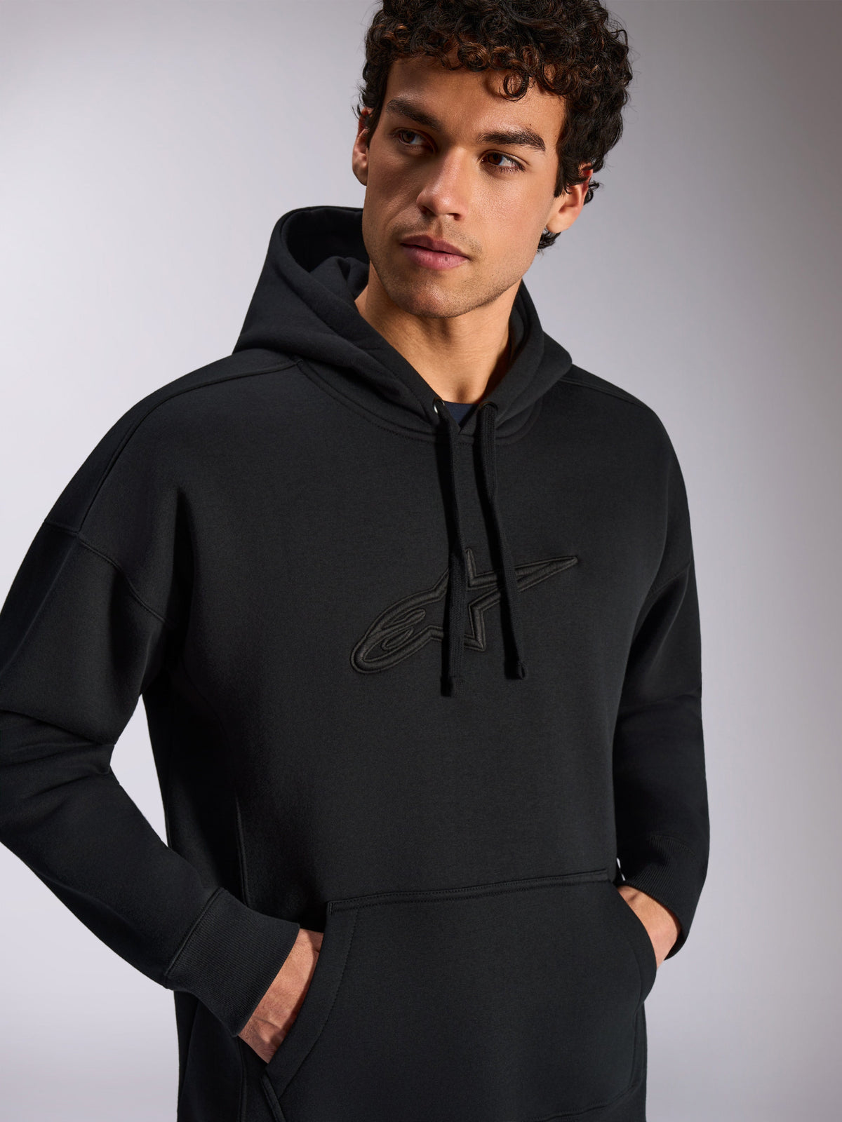 Alpinestars Emergent Oversized Hoodie, casual streetwear, black with tonal 3D embroidered star logo, drawstring hood, kangaroo pocket, relaxed oversized fit