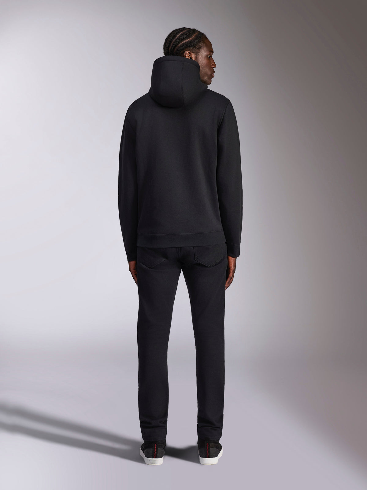 Alpinestars Pulse Hoodie, casual streetwear, back view of solid black pullover fleece with hood, rib cuffs and hem, modern motorsport-inspired design