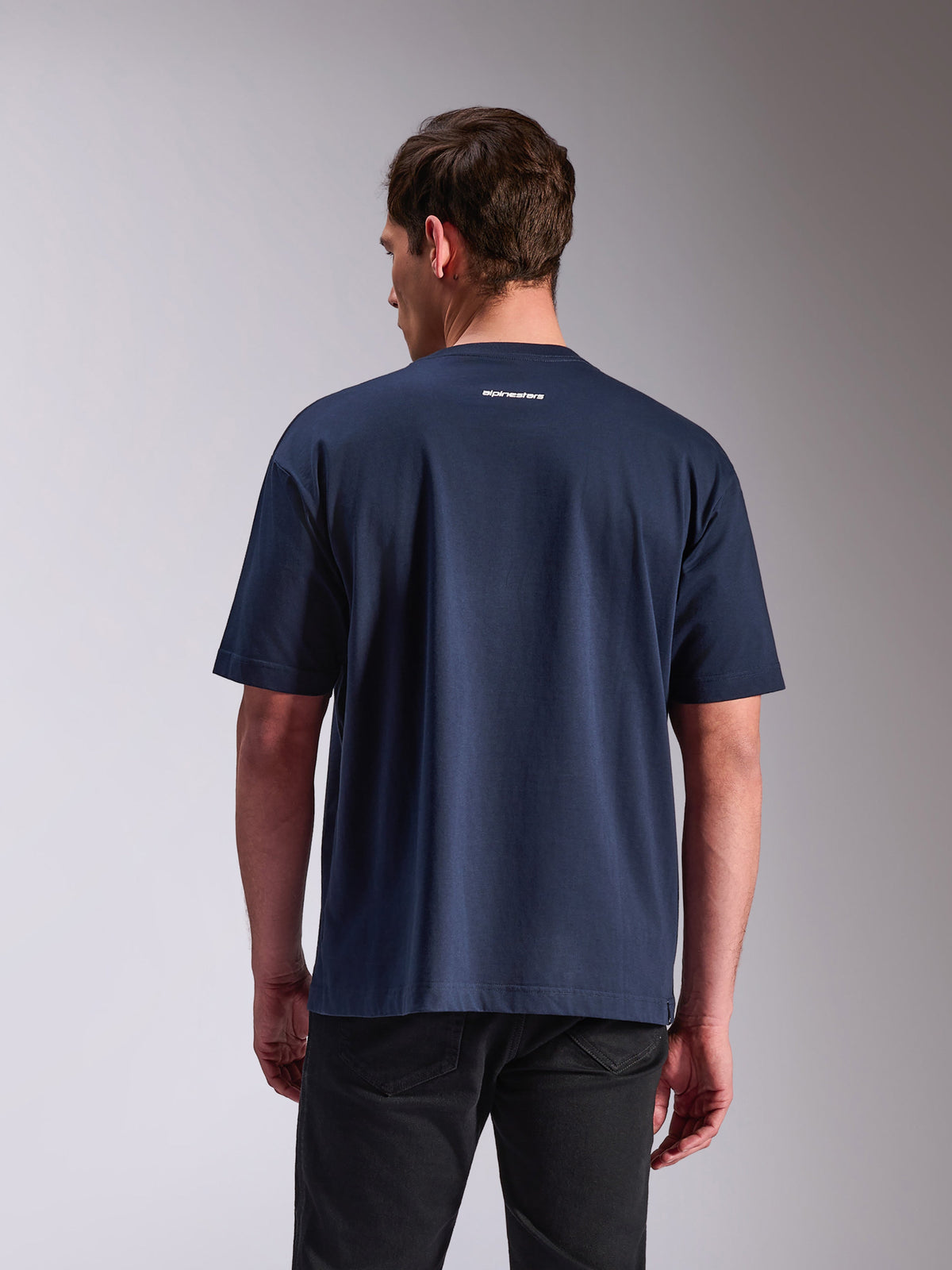 Alpinestars Focused Oversized CSF Tee, Short Sleeve T-Shirt, Navy, back view showing small white Alpinestars word logo, relaxed fit, casual motorsport-inspired streetwear