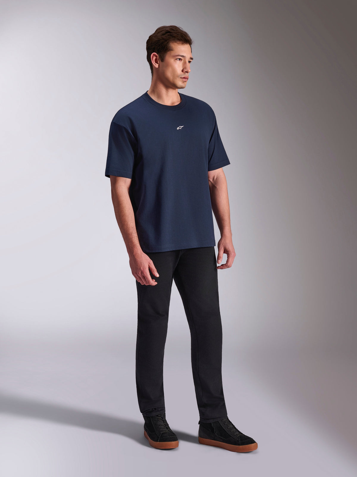 Alpinestars Focused Oversized CSF Tee, Short Sleeve T-Shirt, Navy Blue, small white Astars logo on chest, oversized silhouette, casual lifestyle streetwear worn with black pants and sneakers