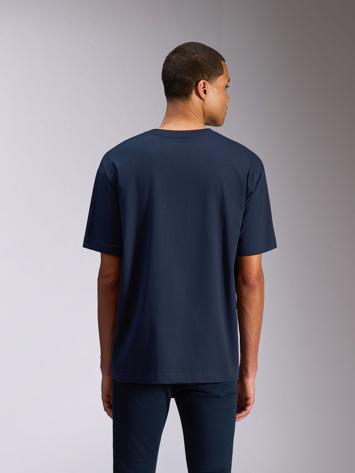 Alpinestars Alter Oversized CSF Tee, koszulka z krótkim rękawem, granatowa, widok z tyłu prezentujący luźny krój oversize i prosty design, styl streetwear