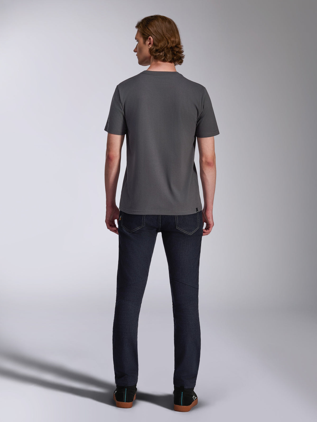 Alpinestars Waving CSF Tee, Short Sleeve T-Shirt, Charcoal, back view, worn with dark denim jeans, casual motorsport-inspired streetwear