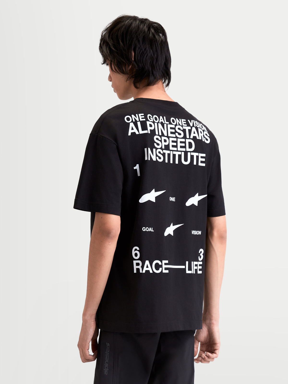 Alpinestars Institute Oversized CSF Tee, Men's Sportswear Short Sleeve T-Shirt, Black with bold white 'Alpinestars Speed Institute' and 'One Goal One Vision' back graphics, relaxed oversized fit, combed cotton-poly blend.