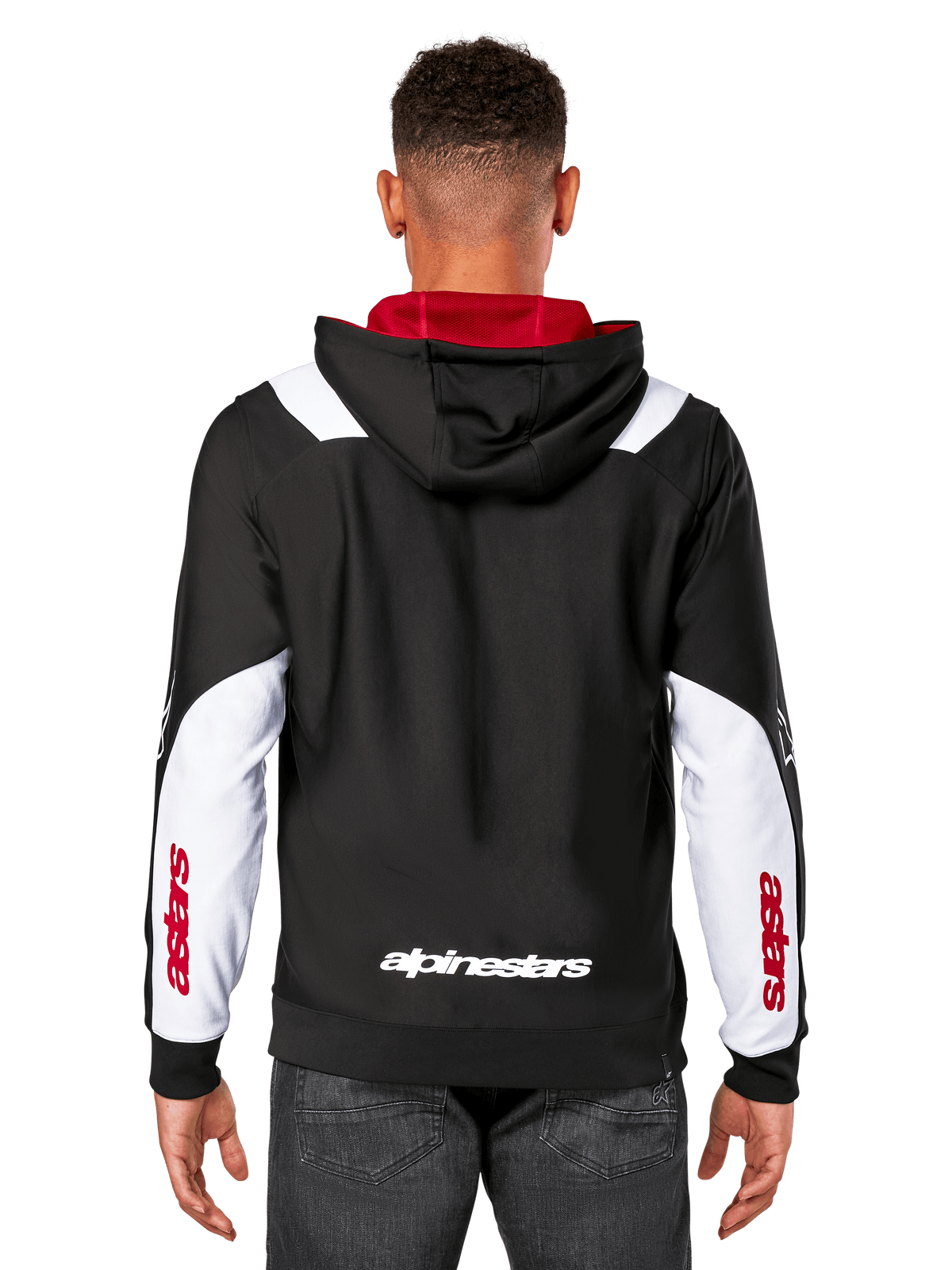 Alpinestars Sessions V3 Hoodie, widok z tyłu, czarna z białymi panelami na rękawach i czerwoną podszewką kaptura, z białym napisem z tyłu i czerwonym brandingiem na rękawach, codzienna odzież streetwearowa inspirowana sportami motorowymi