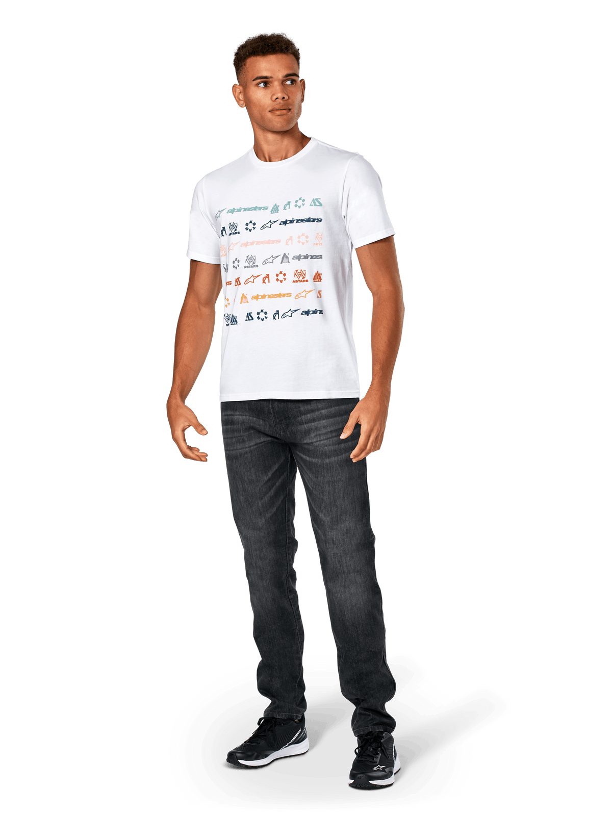 Alpinestars Glyfs CSF Tee, Short Sleeve T-Shirt, White, featuring multi-logo striped graphic on the front, worn with dark grey jeans and black sneakers, casual motorsport-inspired sportswear