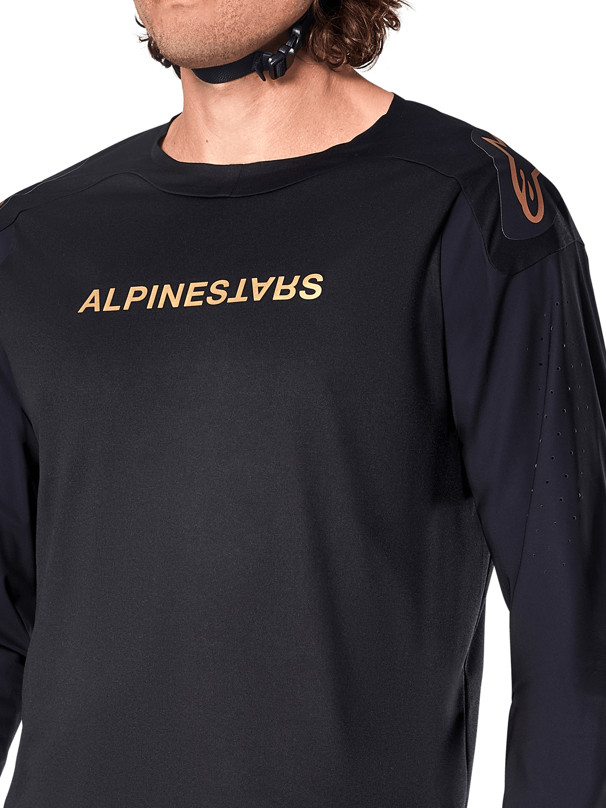 Koszulka Alpinestars A-Aria Polartec Switch z długim rękawem, czarna, brązowe logo Alpinestars na piersi i ramieniu, laserowe perforacje na rękawach zapewniające wentylację, techniczna odzież MTB