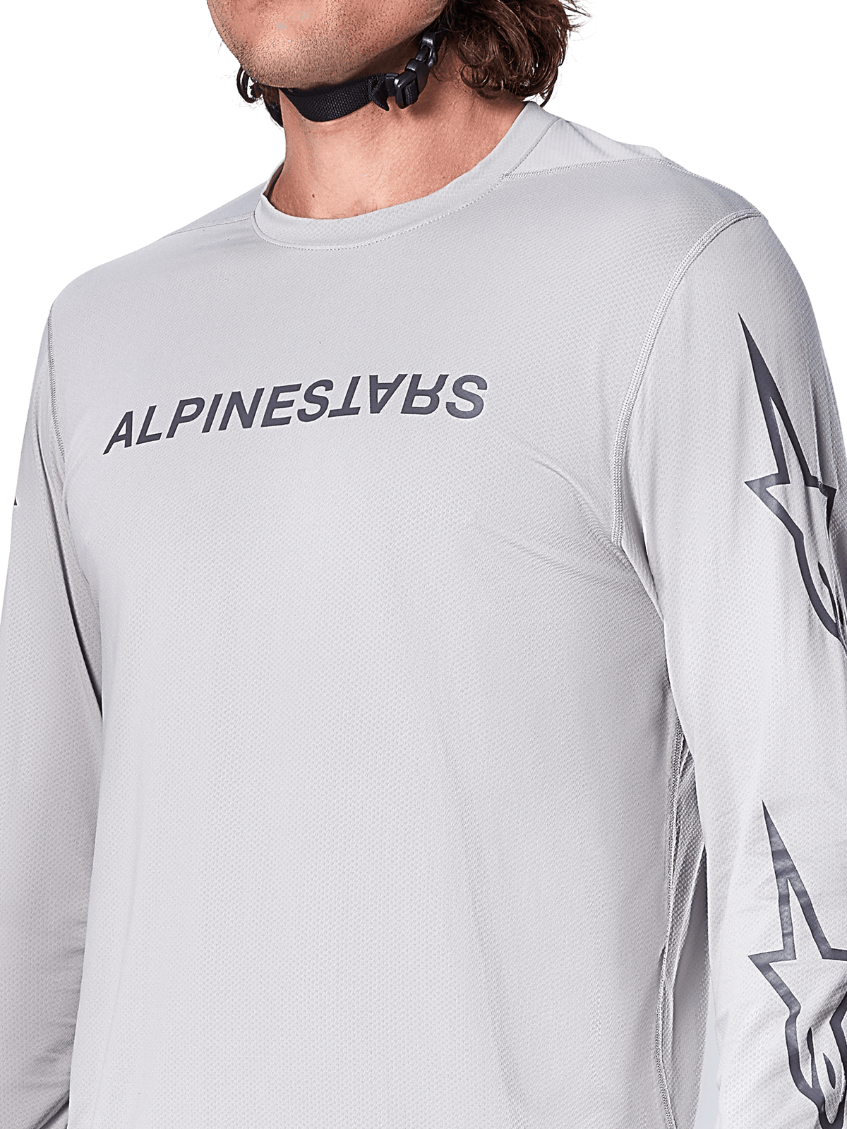 Alpinestars A-Dura Switch Jersey - Long Sleeve, jasnoszara koszulka rowerowa MTB z ciemnoszarym napisem na piersi i logo gwiazdy na rękawie, oddychająca żakardowa tekstura, wydajna odzież rowerowa do jazdy po szlakach