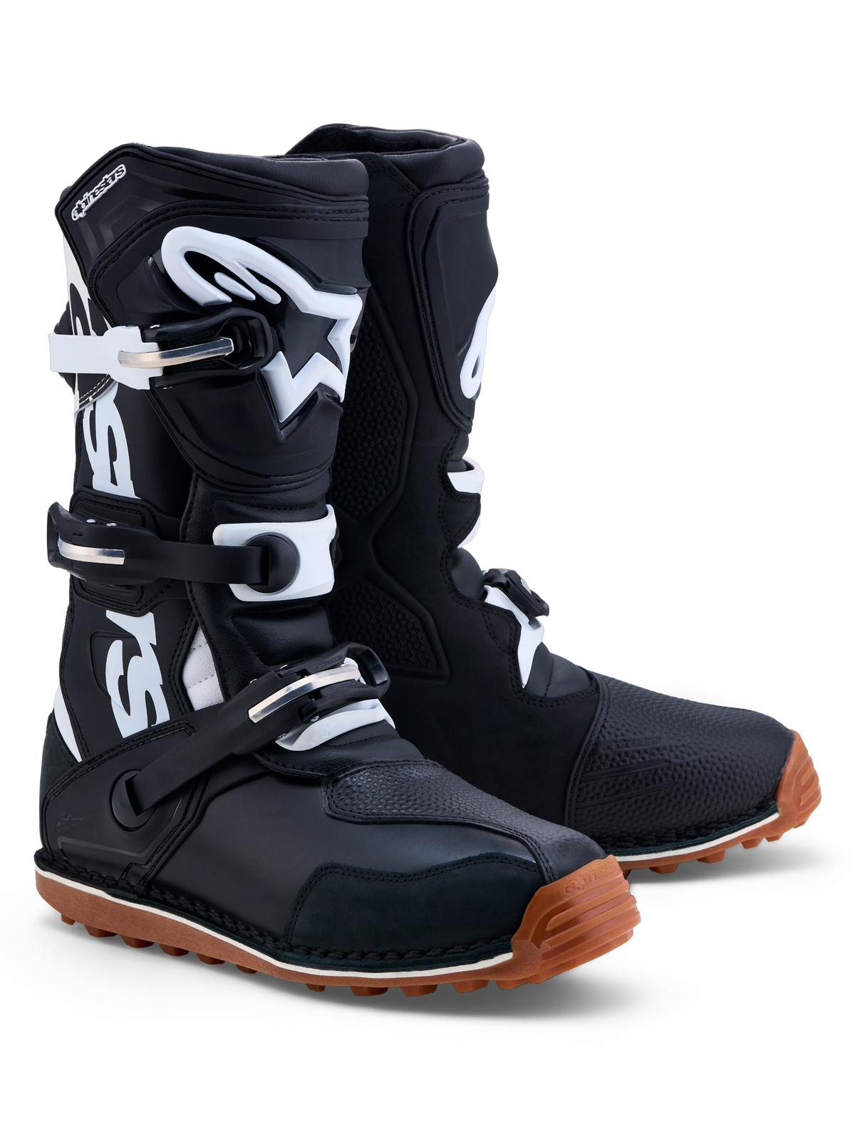 Buty Alpinestars Tech-T, męskie buty motocyklowe do trialu, czarne i białe, skórzana konstrukcja z osłoną goleni TPU i brązową gumową podeszwą, certyfikowane CE.