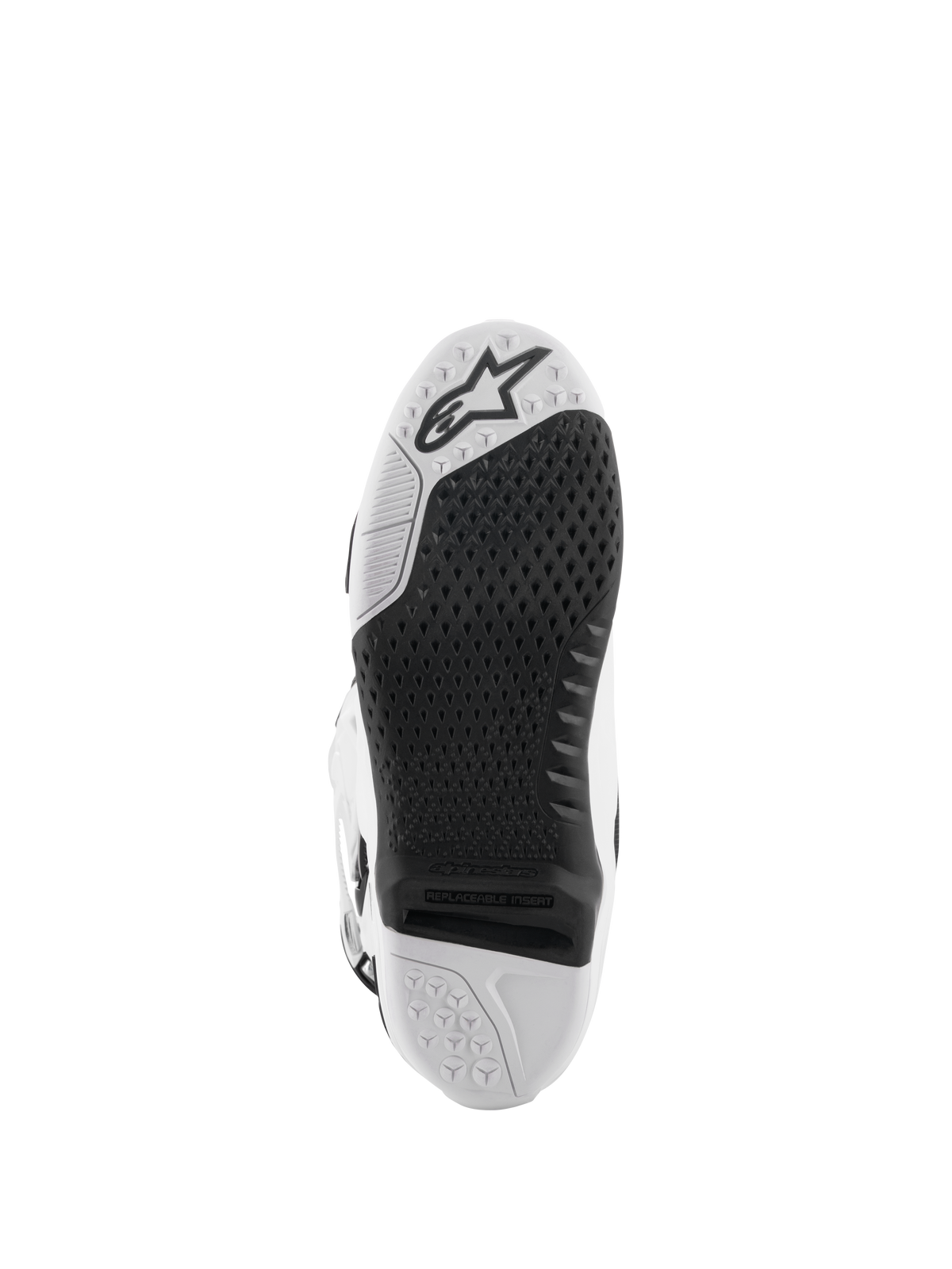 Buty Alpinestars Tech 10, buty motocrossowe, biało-czarne, widok od dołu na podeszwę z teksturowanym wzorem przyczepności, logo Alpinestars i wymienną wkładką centralną do wyścigów off-road