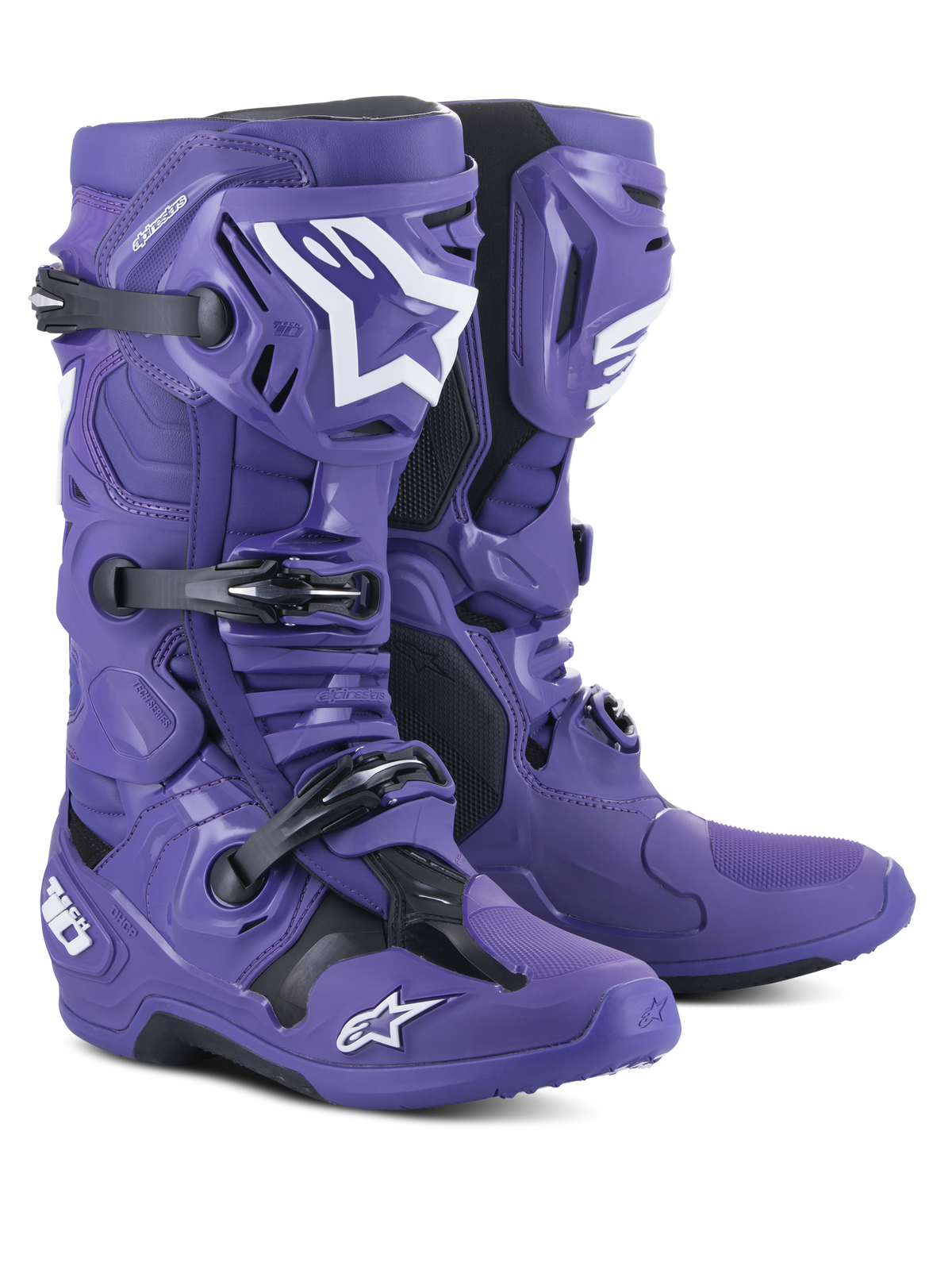 Buty motocrossowe Alpinestars Tech 10, fioletowe (Ultraviolet Purple) z czarnymi i białymi akcentami, system potrójnych klamer, ochronna skorupa TPU, logo gwiazdy Alpinestars, wysokowydajne obuwie wyścigowe off-road
