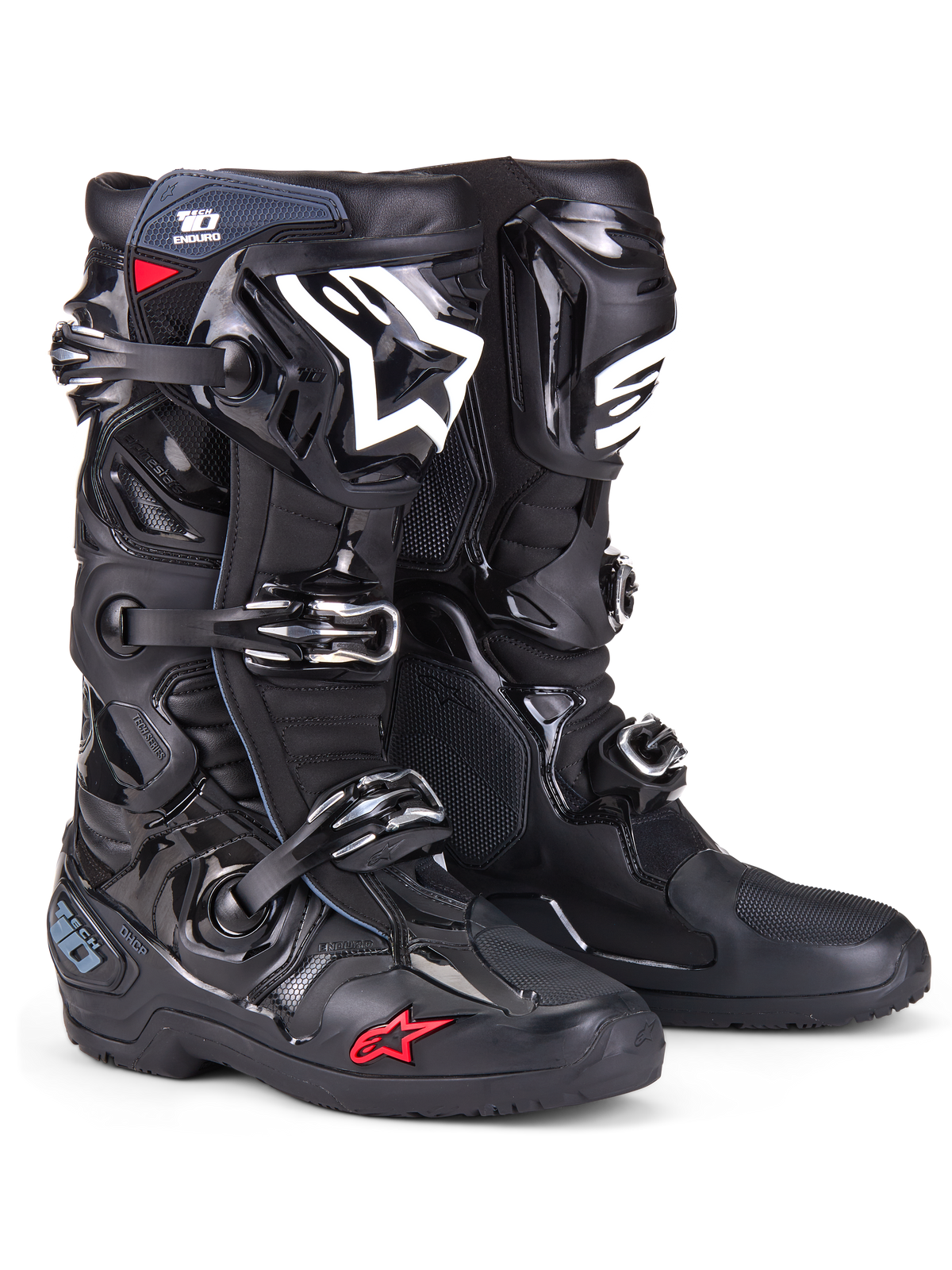 Buty Alpinestars Tech 10 Enduro, buty motocrossowe, czarne z białym logo na goleniach i małym czerwonym detalem w kształcie gwiazdy, system potrójnego zapięcia na klamry, wytrzymała osłona TPU i specjalistyczna podeszwa enduro do wyścigów terenowych