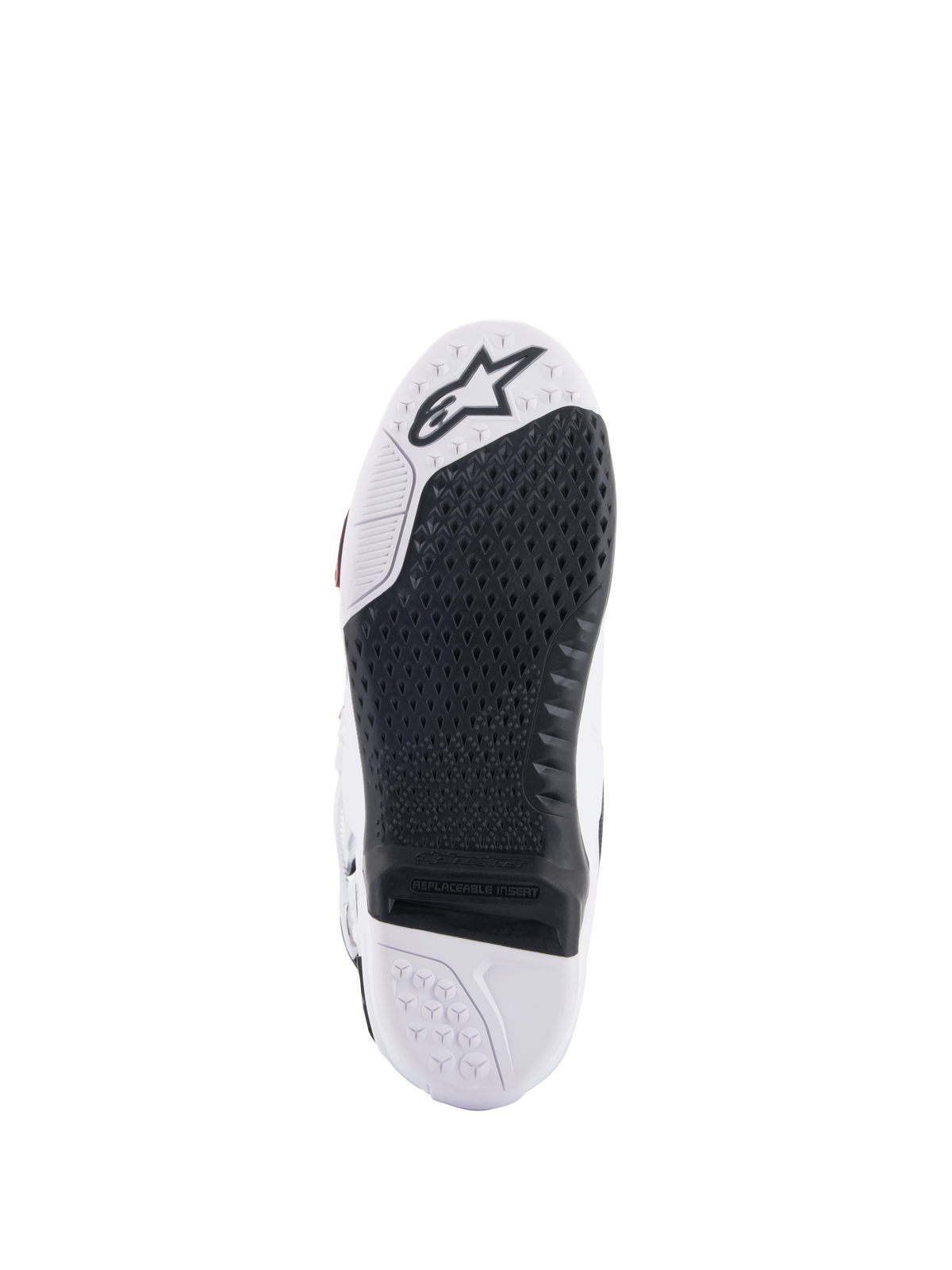 Buty Alpinestars Tech 10 Supervented, widok podeszwy w kolorze biało-czarnym, z rozszerzonym wzorem plastra miodu, czarna wymienna wkładka centralna, biały czubek z logo gwiazdy Alpinestars, zoptymalizowane pod kątem kontroli na podnóżkach motocrossowych
