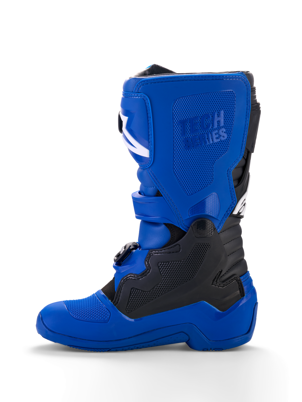 Alpinestars Yamaha Youth Tech 7S Boots, młodzieżowe buty motocrossowe, niebieskie z czarnymi i białymi akcentami, widok z boku, wytłoczone logo „Tech Series”, panele ochronne TPU, system zapięcia na klamry, wytrzymała niebieska podeszwa do jazdy w terenie
