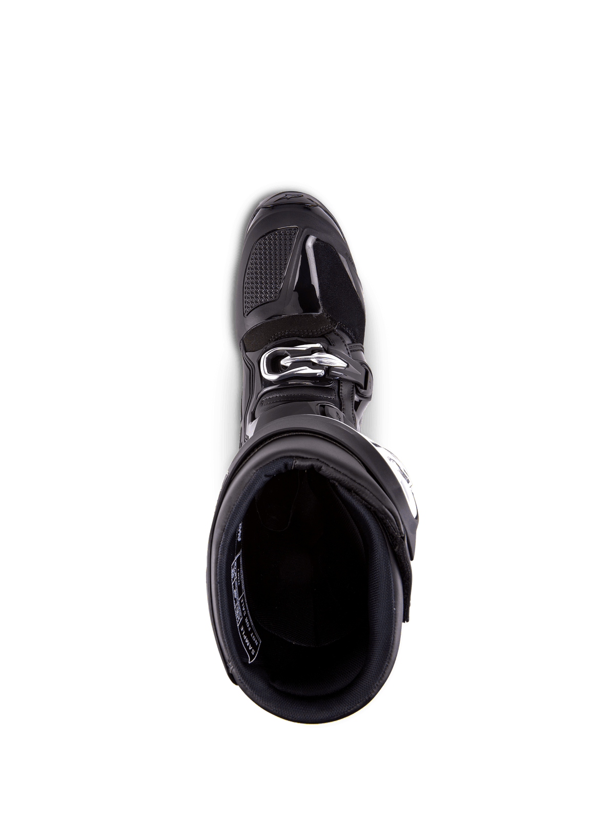 Buty Alpinestars Tech 7, buty motocrossowe, czarne, widok z góry na wyściółkę wewnętrzną, ze srebrnym zapięciem na klamrę i wzmocnionym obszarem palców, profesjonalne obuwie wyścigowe off-road.