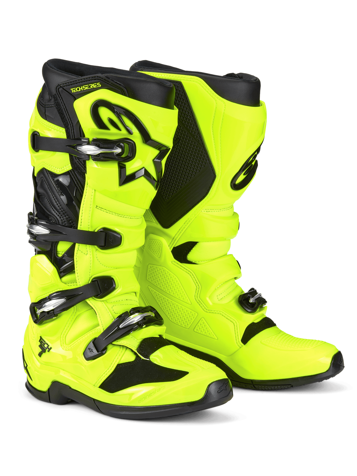 Buty motocrossowe Alpinestars Tech 7, żółte neonowe i czarne, wyposażone w system zapięcia na cztery klamry, ochronną skorupę TPU, czarne logo Astars na goleni i wytrzymałą dwuskładnikową podeszwę do wyścigów off-road
