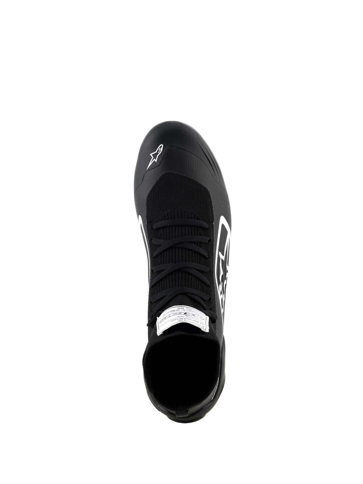 Buty Alpinestars Supertech K, buty kartingowe, czarno-białe, widok z góry na w pełni dzianinową cholewkę z czarnymi sznurowadłami, białe logo Alpinestars na nosku, etykieta z certyfikatem FIA na języku