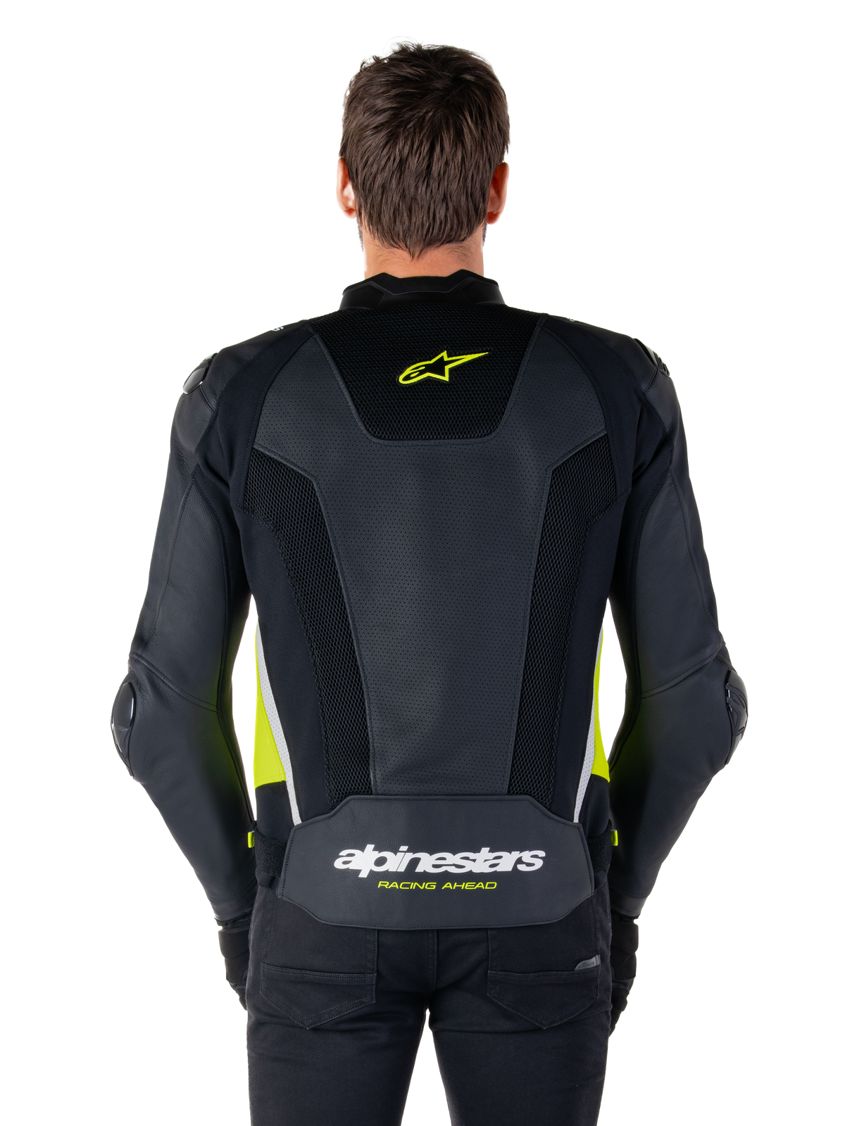 Skórzana kurtka Alpinestars Missile V3 Airflow, widok z tyłu, czarna z żółtymi fluo i białymi akcentami, obszerne panele z perforowanej skóry dla lepszego chłodzenia, logo Alpinestars w górnej i dolnej części pleców, sportowa kurtka motocyklowa inspirowana wyścigami