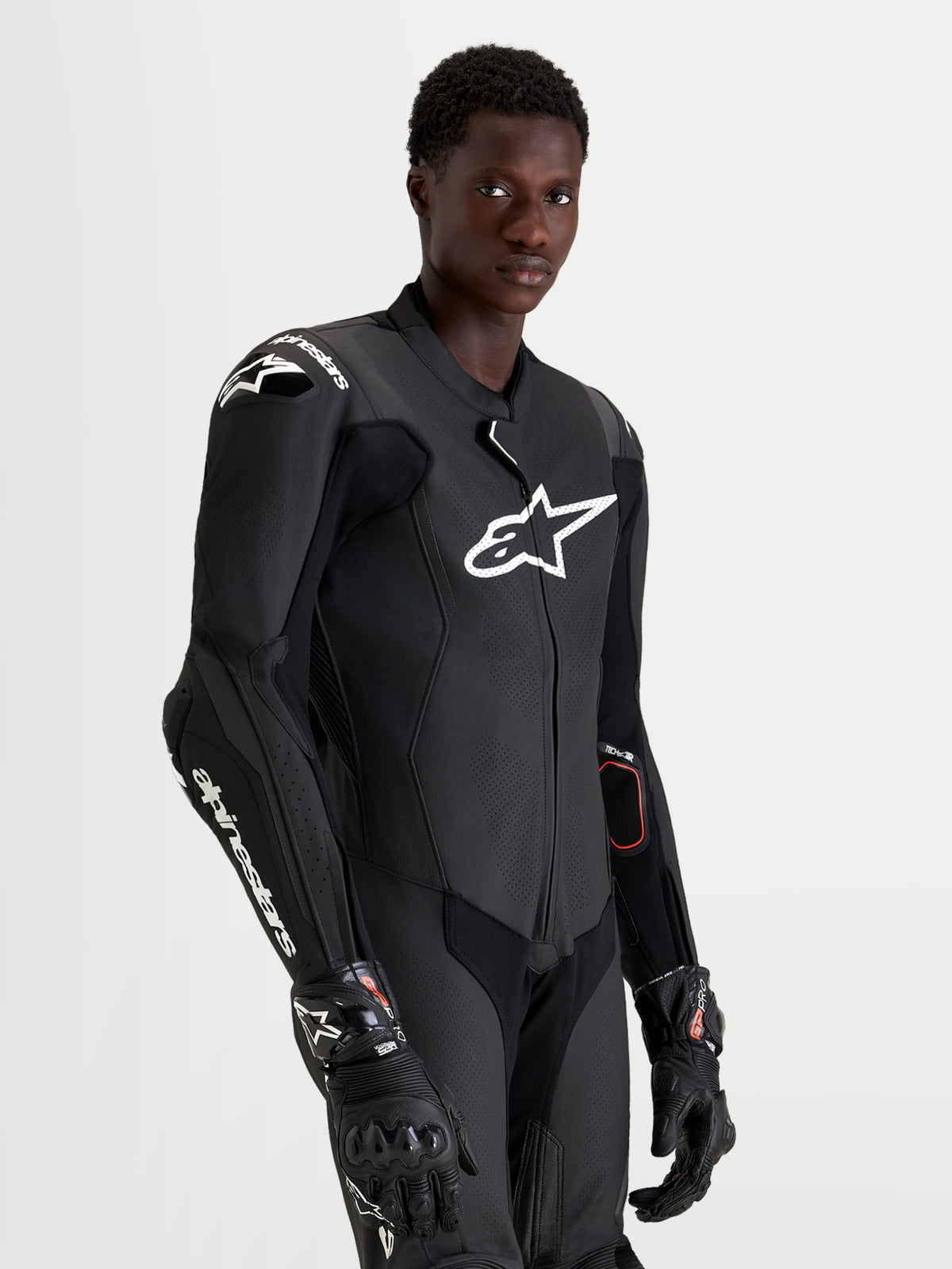 Alpinestars Missile V3 Leather Suit -1 Piece, Men's Black motorcycle racing suit featuring AAA-rated leather, integrated armor, and white chest and shoulder logos