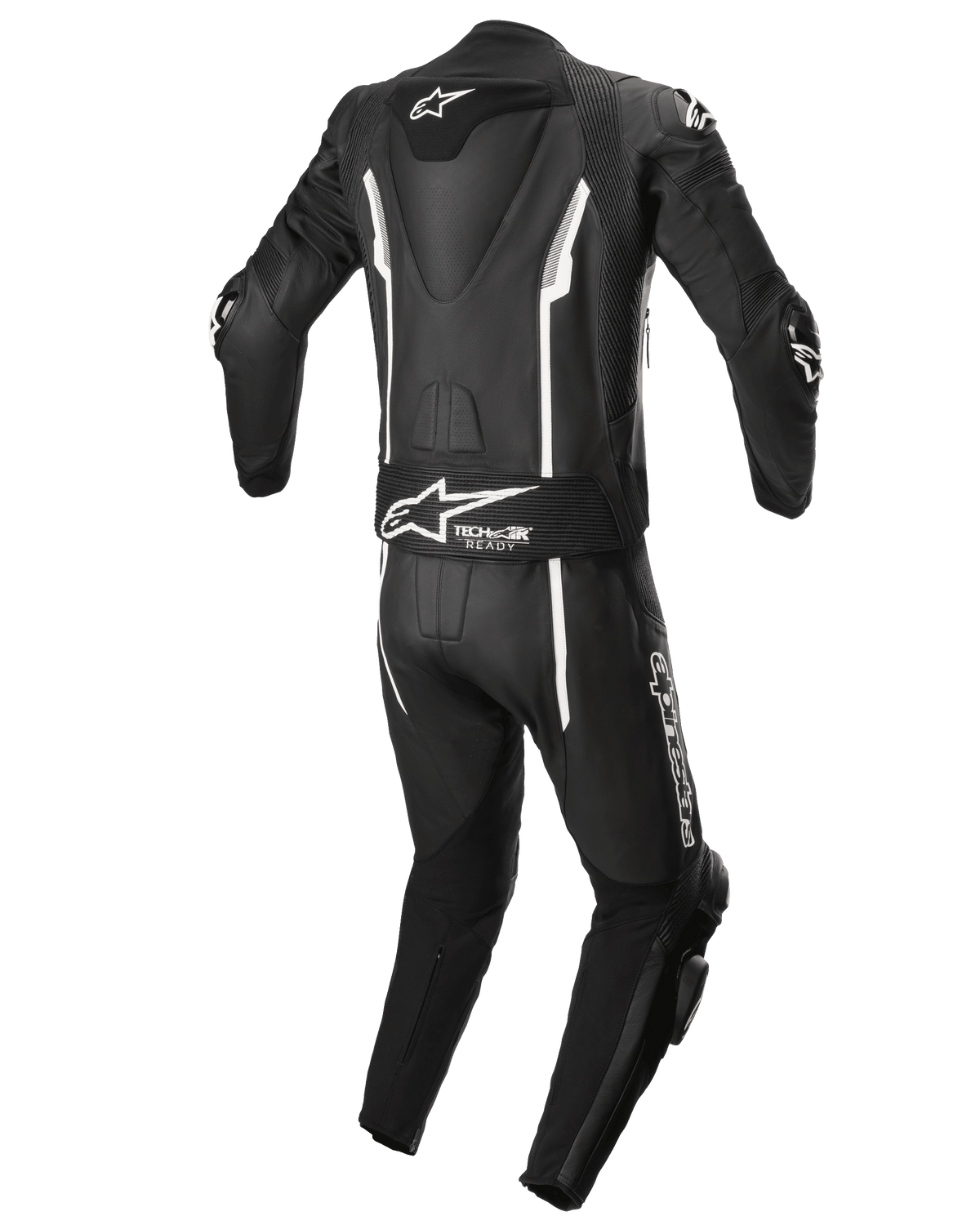 Alpinestars Missile V2 2-Piece Leather Suit, dwuczęściowy skórzany kombinezon motocyklowy, czarno-biały, widok z tyłu z aerodynamicznym garbem, panel stretch Tech-Air Ready, białe liniowe akcenty oraz branding Alpinestars na dolnej części pleców i nogawce