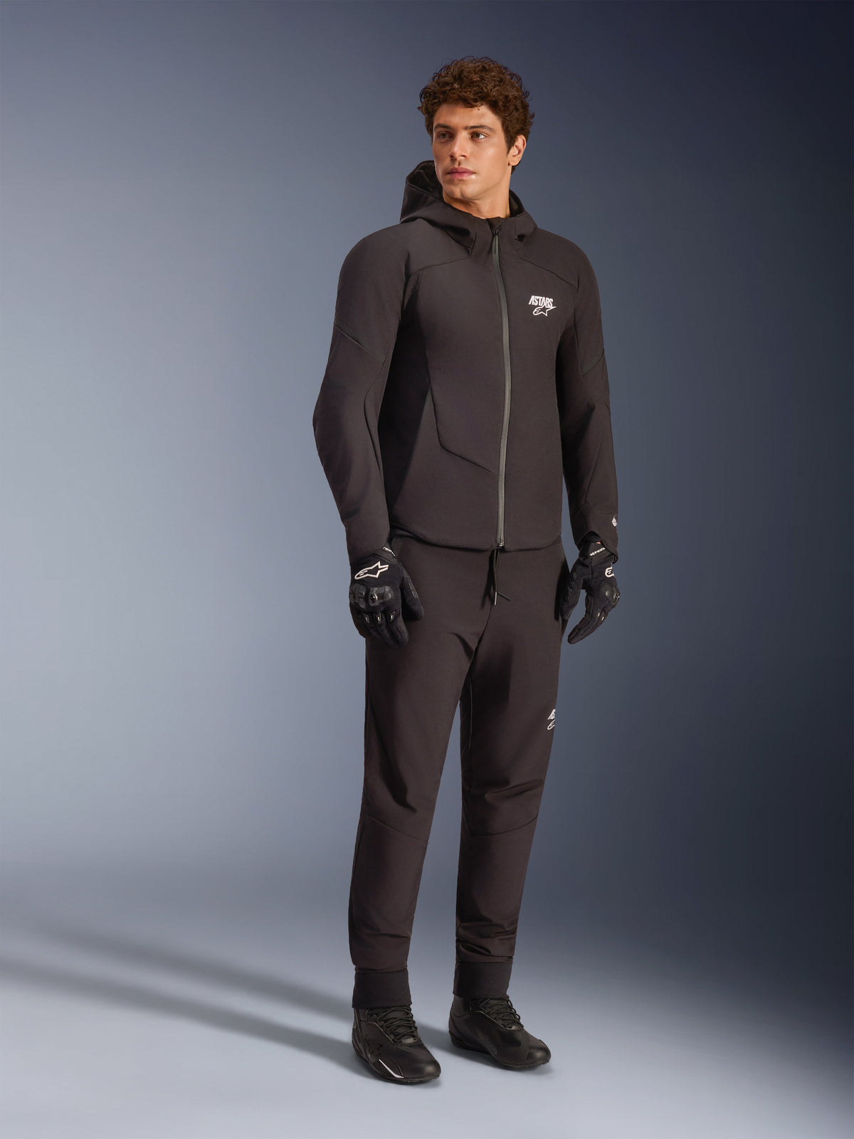 Alpinestars Aeroshell Wodoodporna, czarna męska kurtka motocyklowa softshell z kapturem do jazdy typu naked.