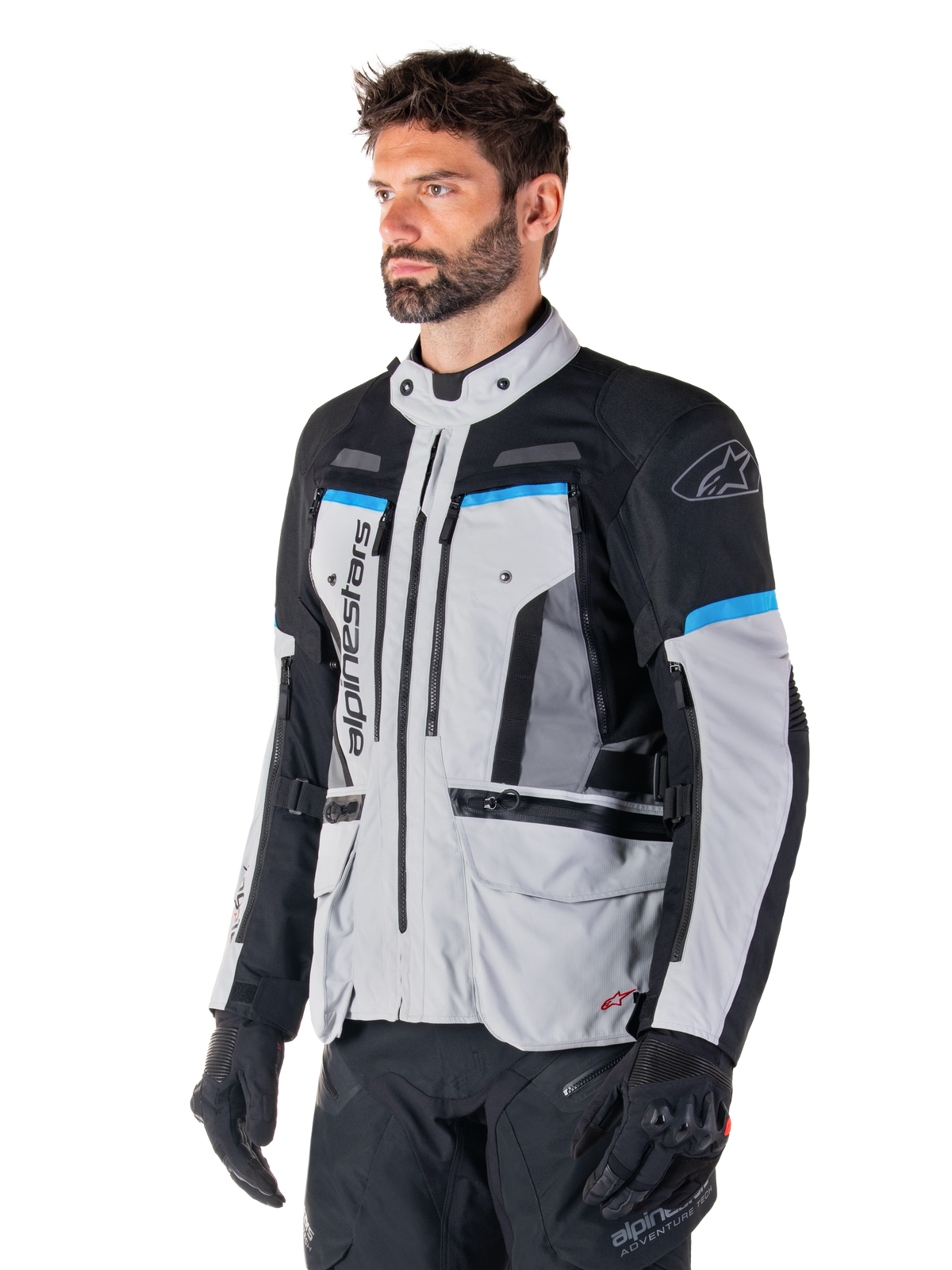 Kurtka Alpinestars Bogota' Pro Drystar®, męska tekstylna kurtka adventure, lodowy szary i czarny z cyjanem, wodoodporna.