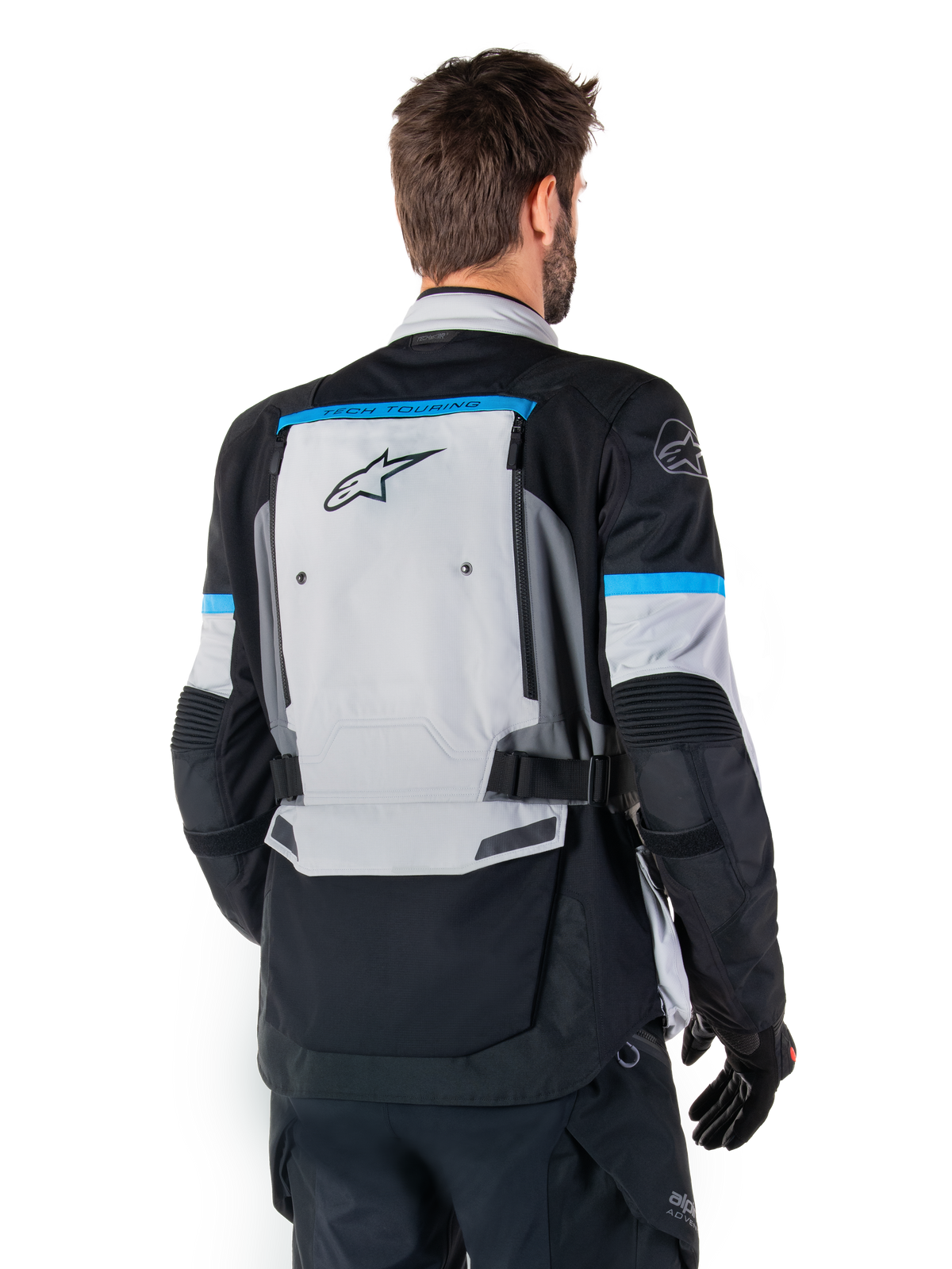 Alpinestars Bogota' Pro Drystar®, męska kurtka motocyklowa adventure, szara i czarna z błękitnym, widok z tyłu, tekstylna.