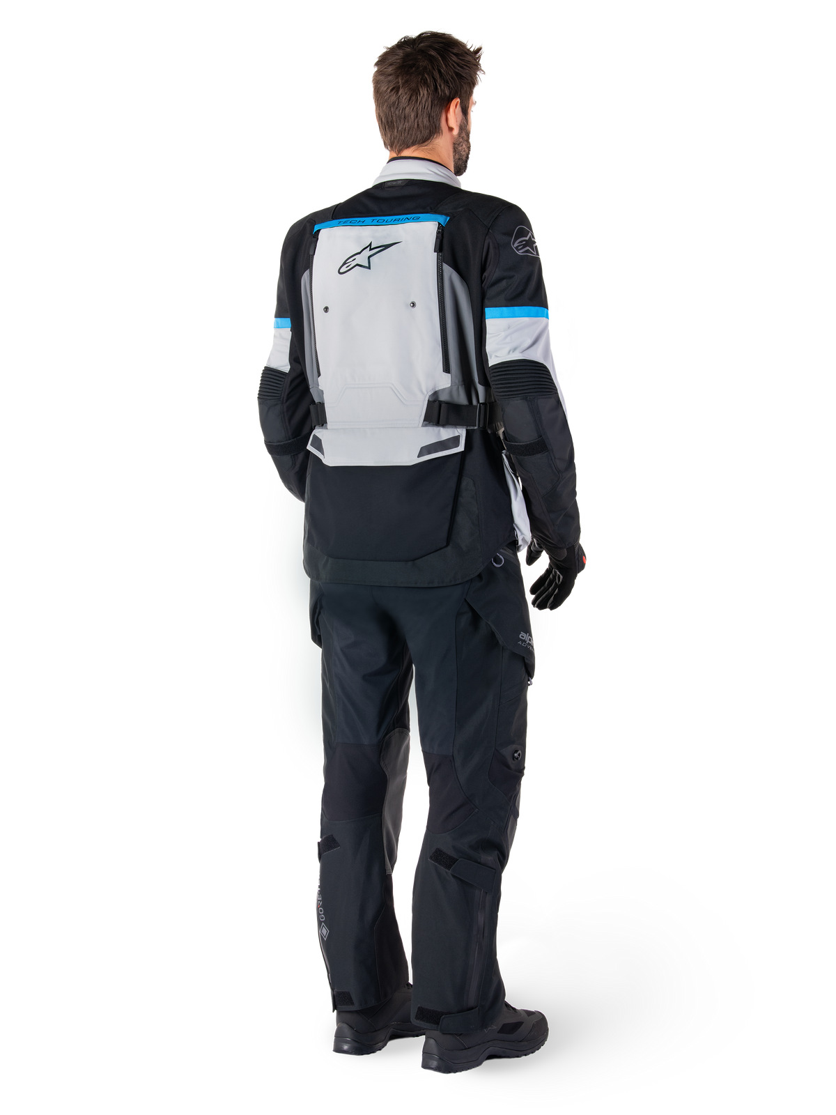Kurtka Alpinestars Bogota' Pro Drystar®, męska kurtka motocyklowa adventure touring, lodowy szary i czarny z akcentami cyjan, widok z tyłu, Tech-Air® Ready.
