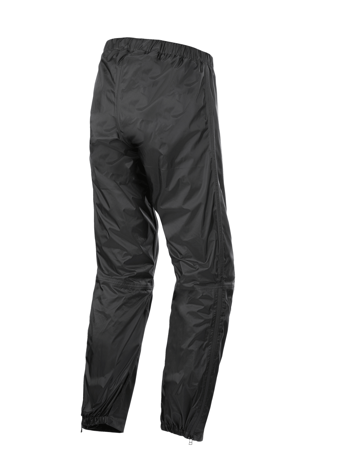 Alpinestars Hurricane Rain V2 Pant, wodoodporne spodnie motocyklowe, czarne, widok z tyłu prezentujący elastyczny pas i mankiety, lekka wiatroszczelna laminowana tkanina z zamkami na dole nogawek ułatwiającymi zakładanie butów, odzież ochronna do turystyki szosowej i adventure