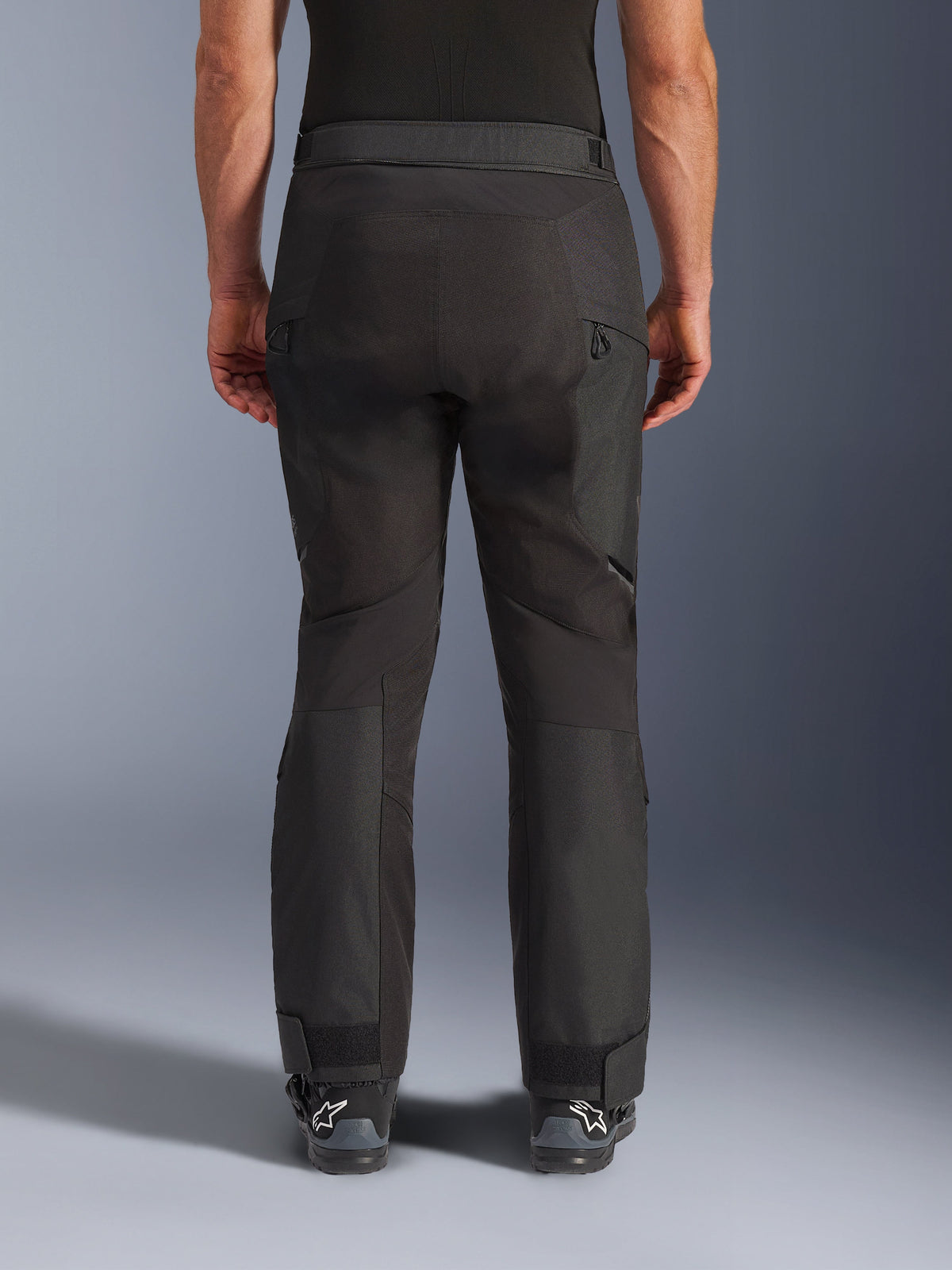 Alpinestars Cusco Drystar® Pants, Motorcycle Adventure Pants, Black, rear view showing articulated panels, zippered thigh vents, and adjustable ankle cuffs, designed for touring and off-road riding