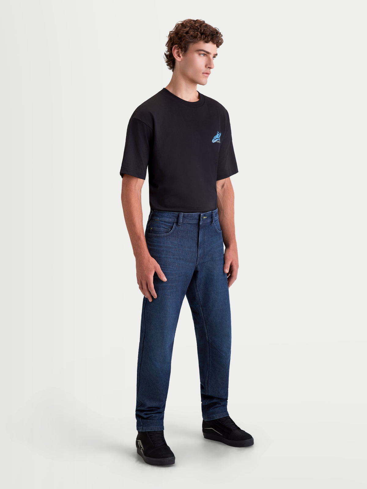 Alpinestars Flex-AST 10 Tough Max Denim Pants Short, men's urban motorcycle denim pants in dark blue, AAA certified single-layer riding jeans worn by a model with a black t-shirt