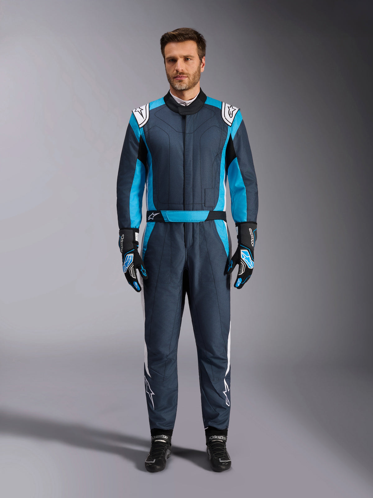 Alpinestars GP Pro Comp V2 Suit, FIA Certified Auto Racing Suit, Men's, Asphalt and Cyan Blue with white accents.