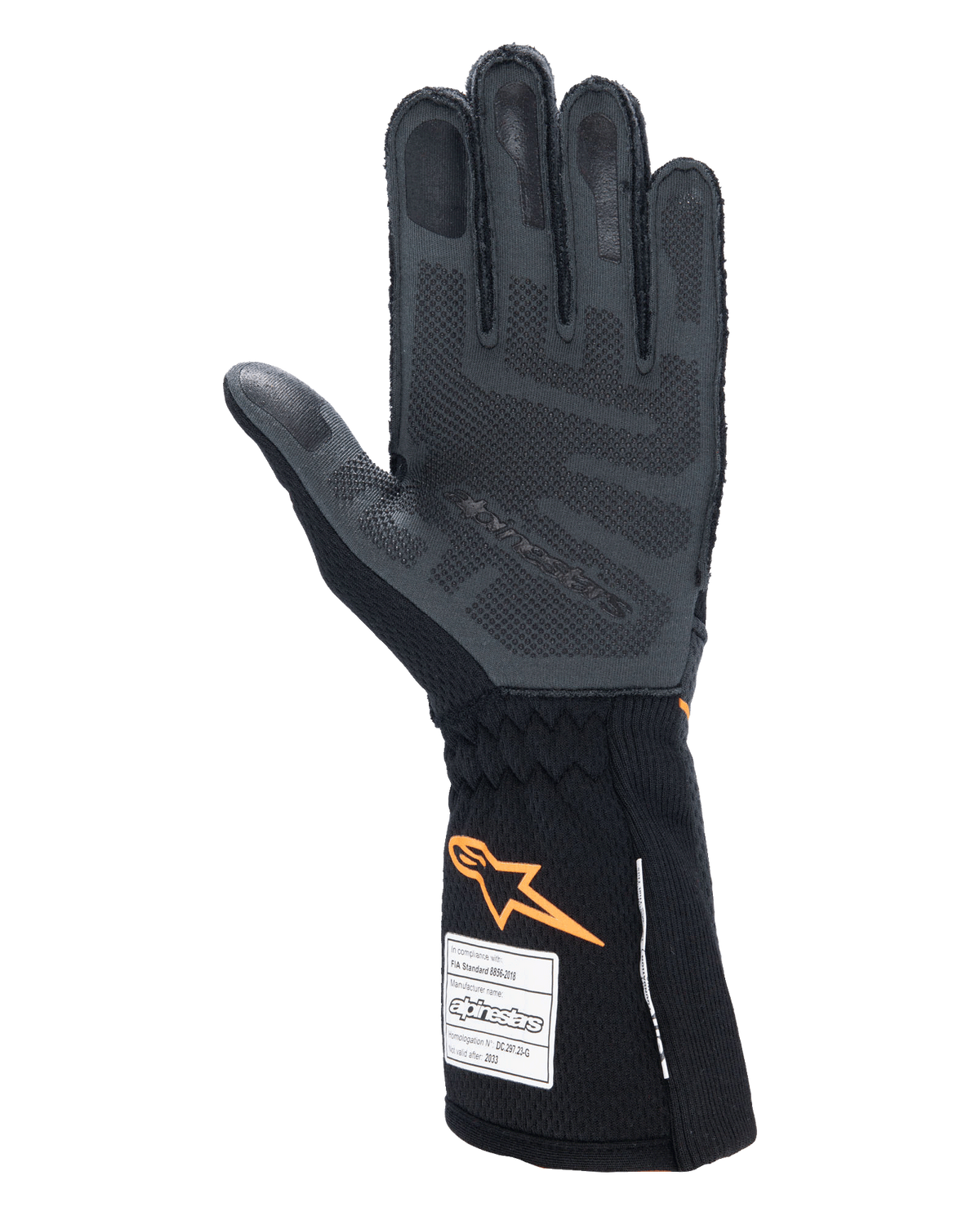 Rękawice Alpinestars Tech-1 ZX V4, samochodowe rękawice wyścigowe, czarne z pomarańczowymi akcentami fluo, widok od wewnętrznej strony dłoni z silikonowym wzorem 3D i teksturą plastra miodu, widoczne etykiety homologacji FIA i SFI na mankiecie, profesjonalny sprzęt do sportów motorowych