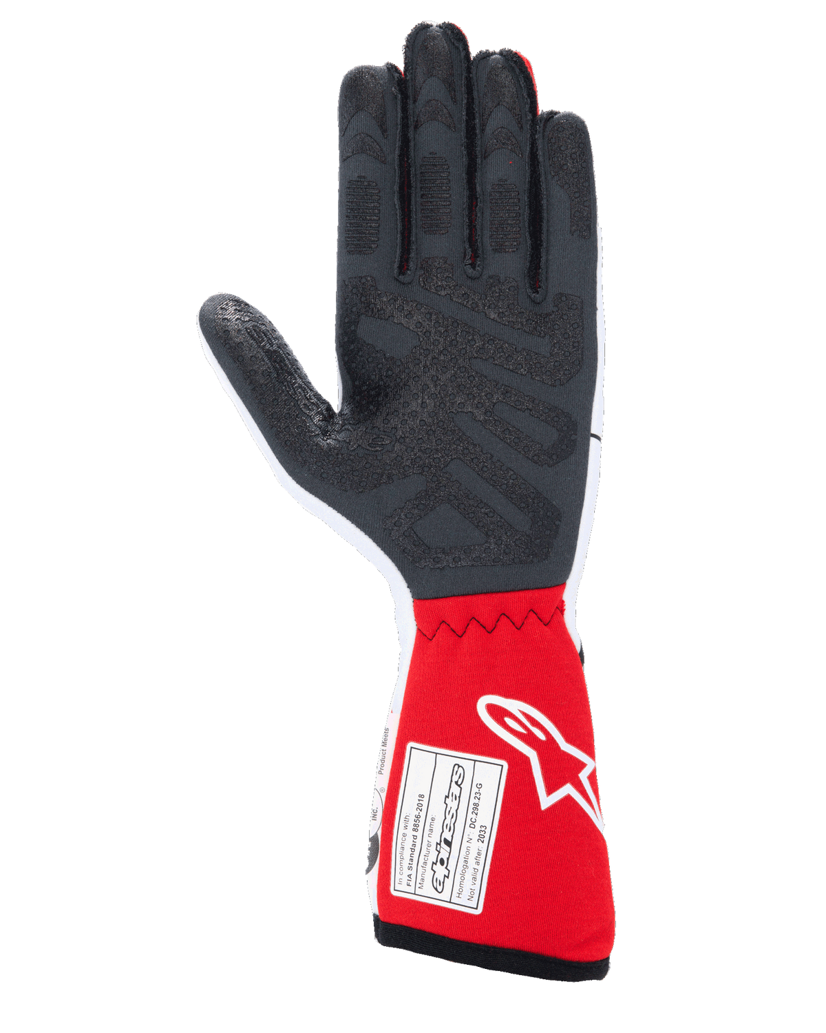 Alpinestars Tech-1 Race V4 Gloves, samochodowe rękawice wyścigowe, biało-czerwone, widok od strony dłoni z czarnymi silikonowymi wzorami poprawiającymi chwyt i etykietą certyfikacyjną FIA 8856-2018 na czerwonym mankiecie, profesjonalny sprzęt do sportów motorowych