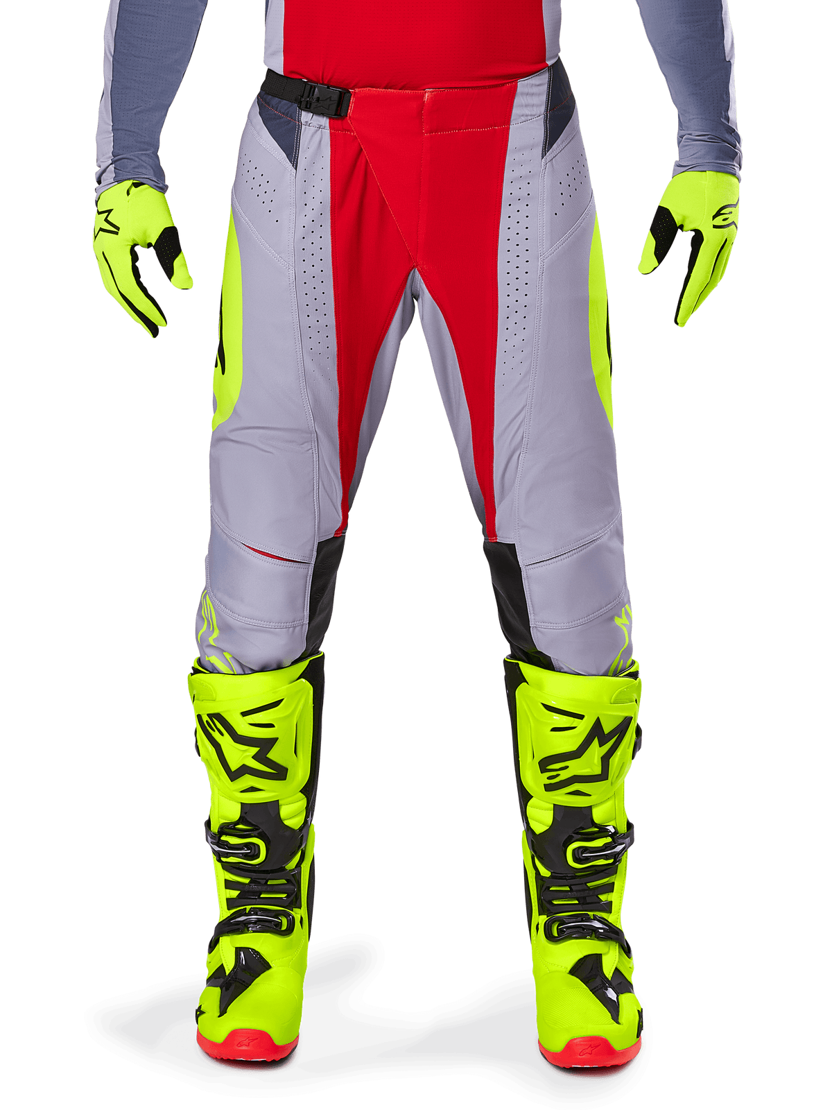 Alpinestars 2025 Techstar Melt Pants, Motocross Pants, Bright Red and Gray with fluorescent yellow accents, worn with matching neon yellow gloves and boots, featuring a magnetic waist buckle and laser-cut perforations for ventilation.