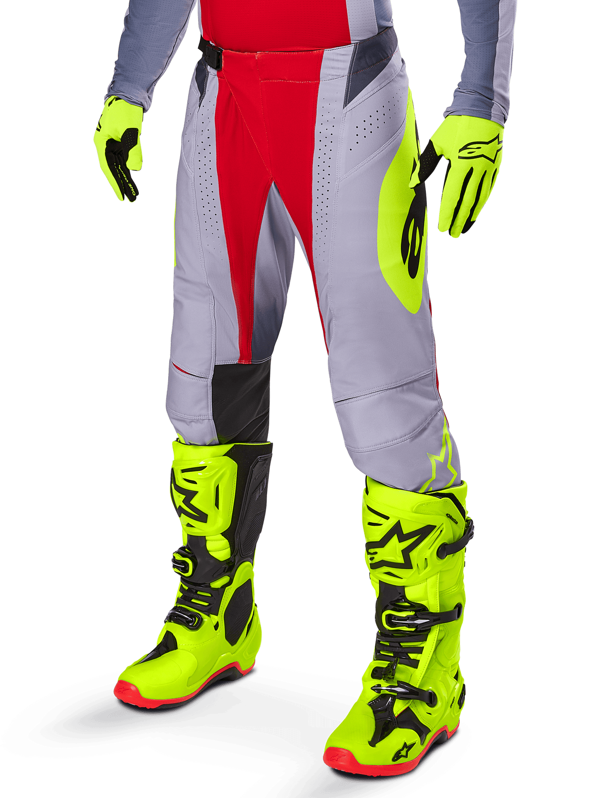 Alpinestars 2025 Techstar Melt Pants, Motocross Pants, Bright Red and Gray, featuring a prominent neon yellow logo, worn with matching neon yellow gloves and boots, athletic fit for motocross racing