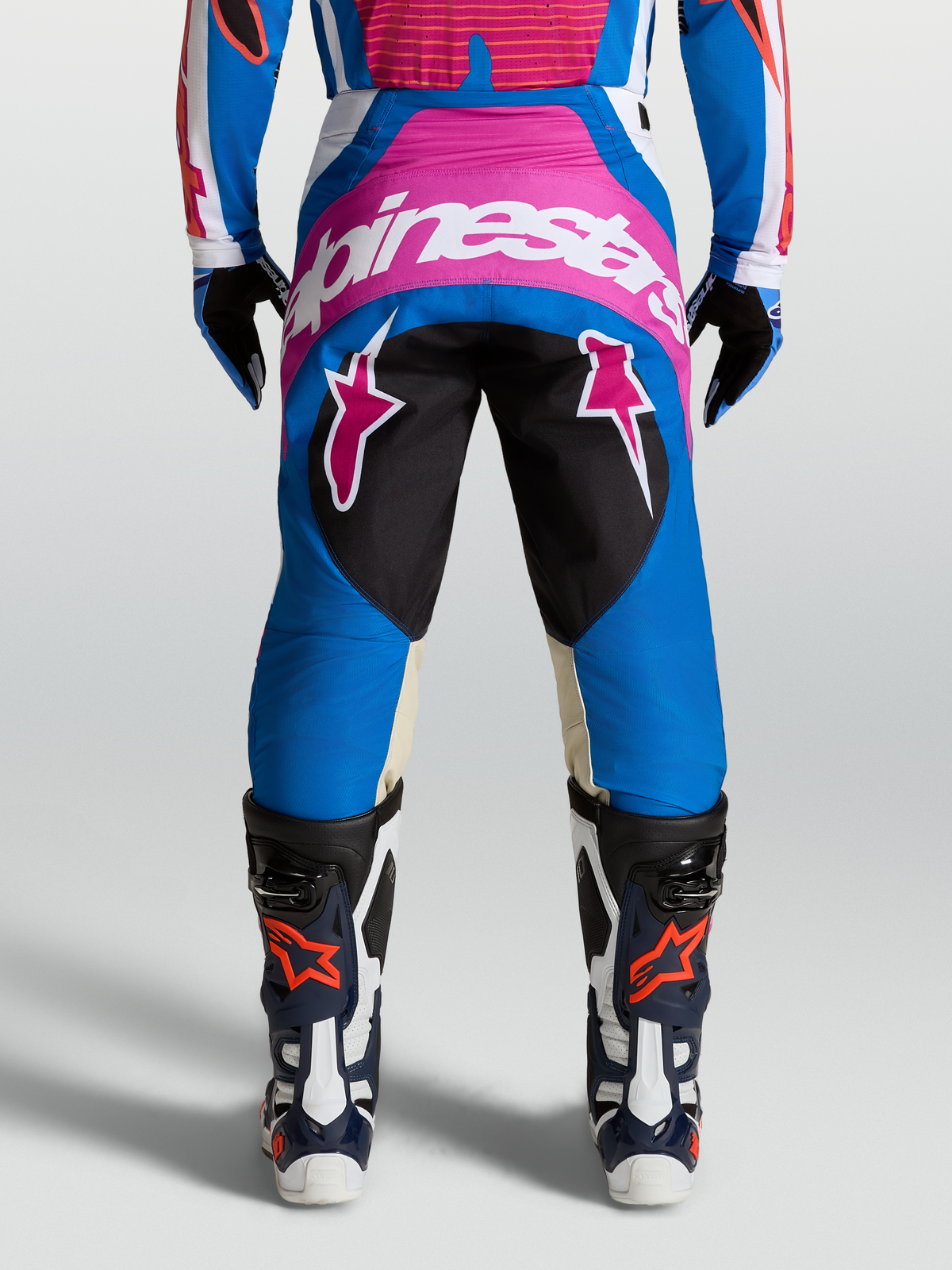 Alpinestars Spodnie Techstar Maven, męskie spodnie motocrossowe, niebieskie i różowe, białe logo, wzmocnione kolana z koziej skóry