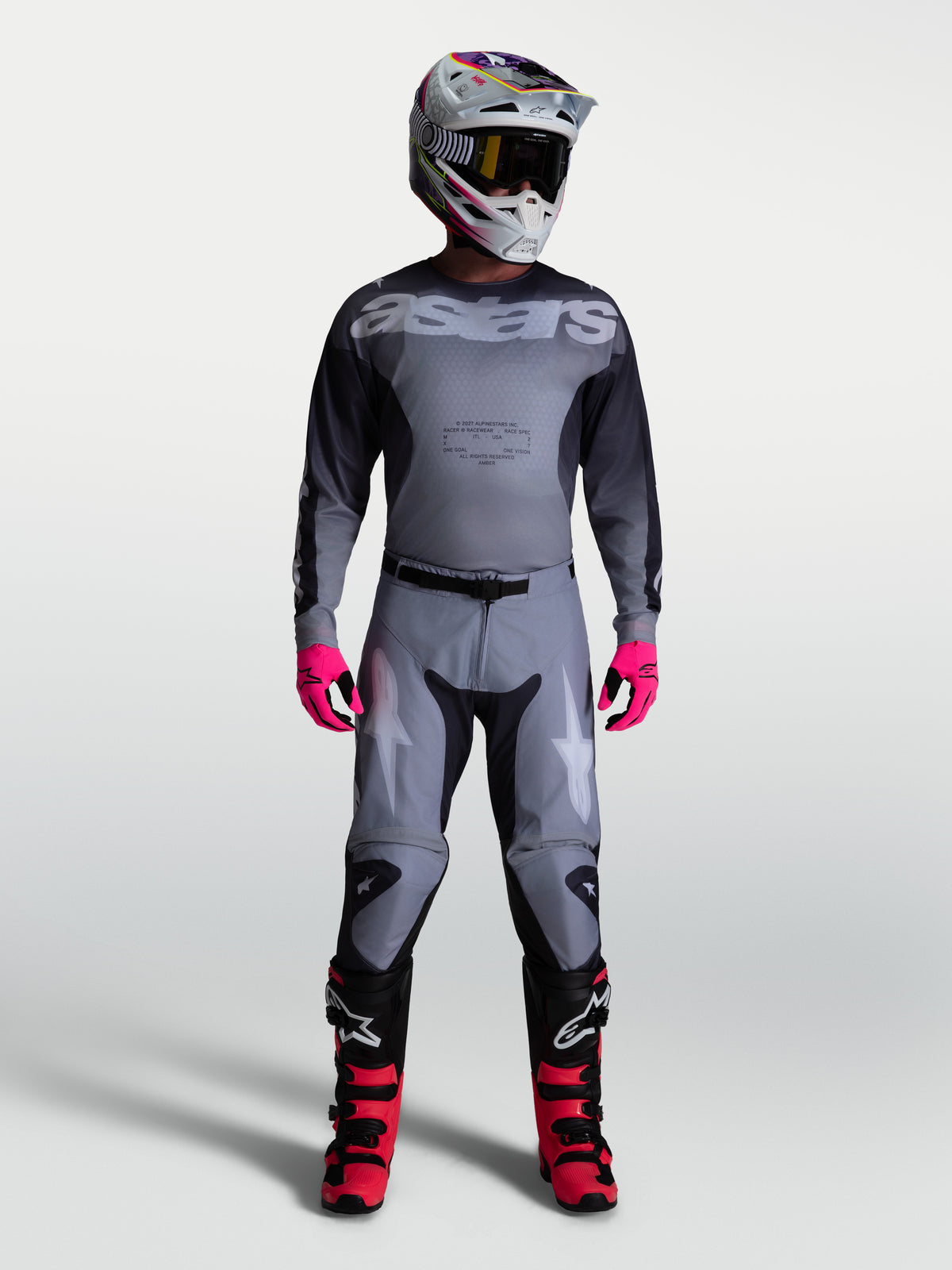 Alpinestars Racer Amber, męskie spodnie motocrossowe, szare z jasnoliliowymi akcentami, wstępnie zakrzywiony krój wyścigowy, profesjonalna odzież off-road.