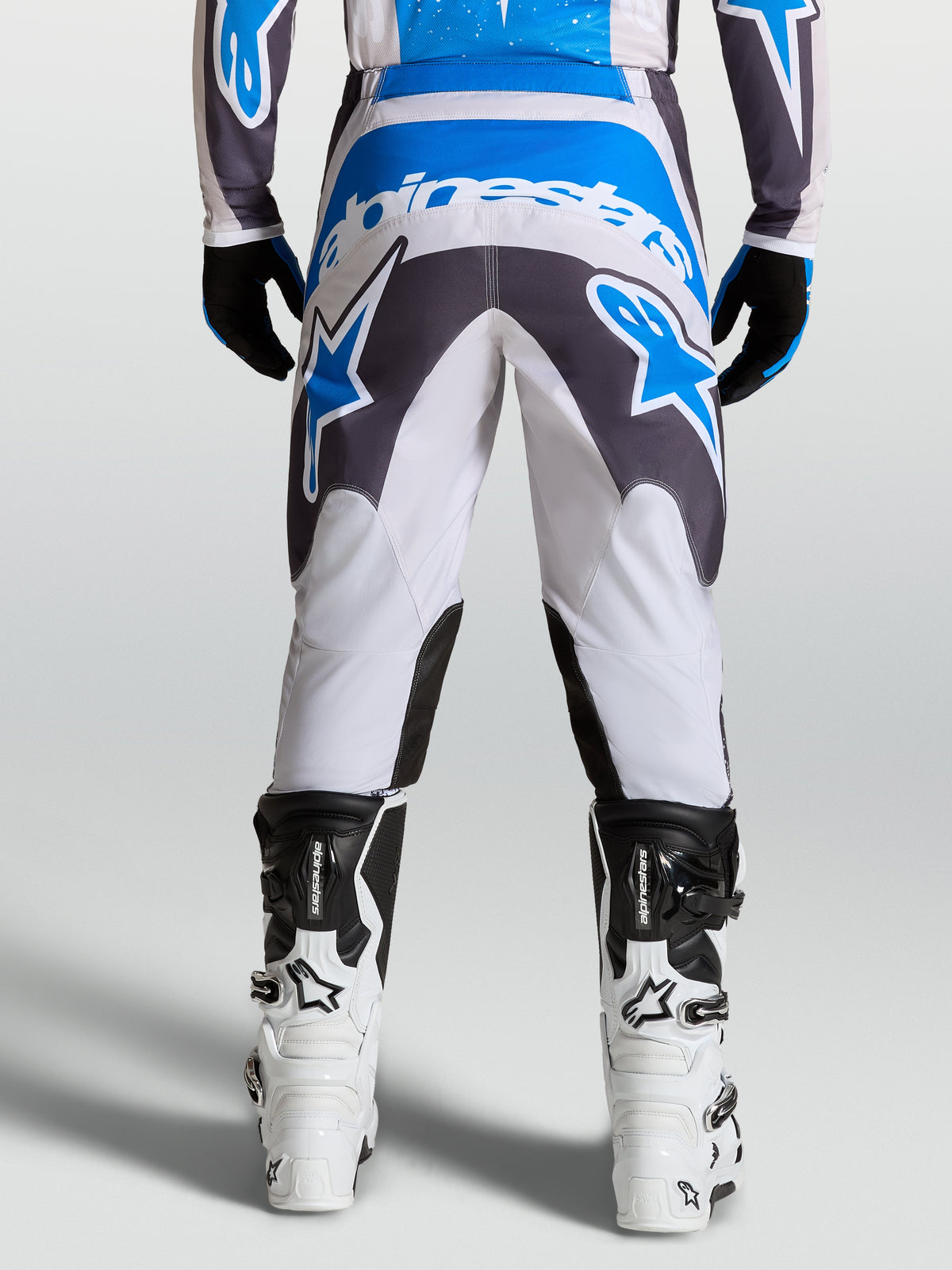 Alpinestars spodnie Fluid Drag, męskie spodnie motocrossowe, szare i niebieskie, wzmocnione siedzenie do jazdy off-road