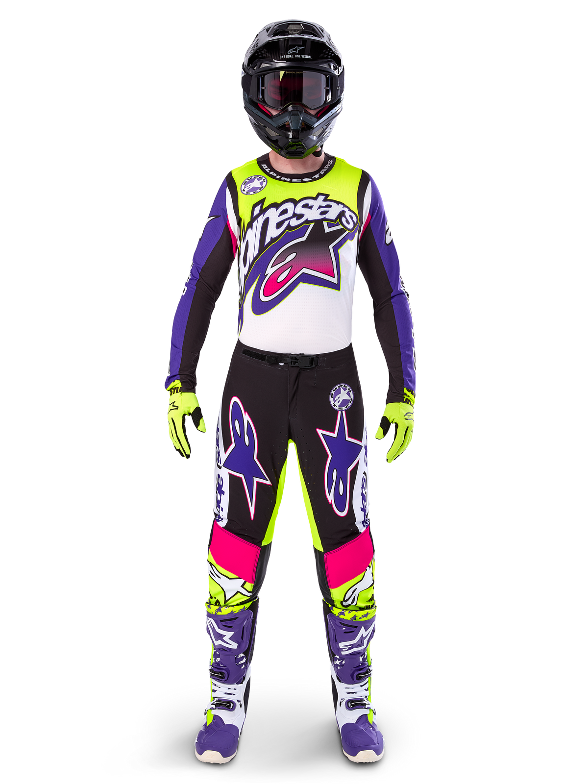 Motocross rider wearing complete racing gear, Limited Edition Supertech Dirt Studios jersey and pants in white, purple, and yellow fluo, black helmet with goggles, purple and white boots, coordinated vibrant outfit for off-road motocross racing