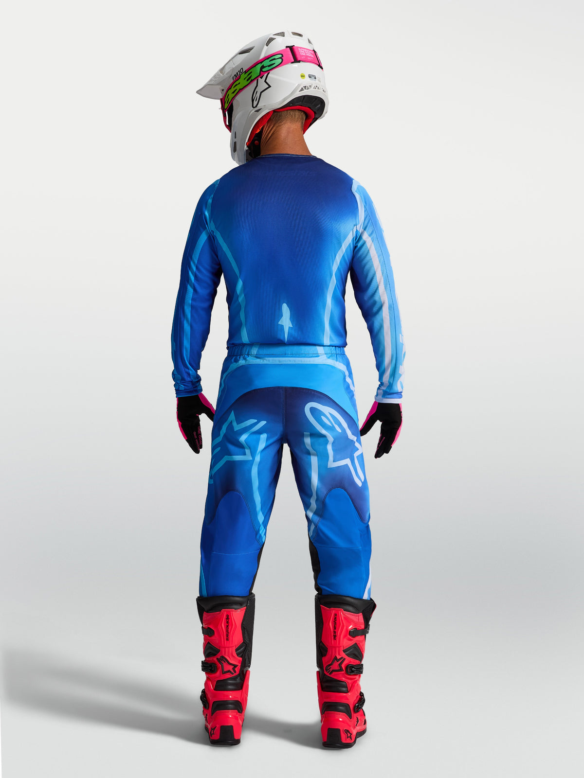 Spodnie Alpinestars Fluid Kepler, męskie spodnie motocrossowe, niebieskie, tył, ergonomiczny krój, trwały poliester 600D.