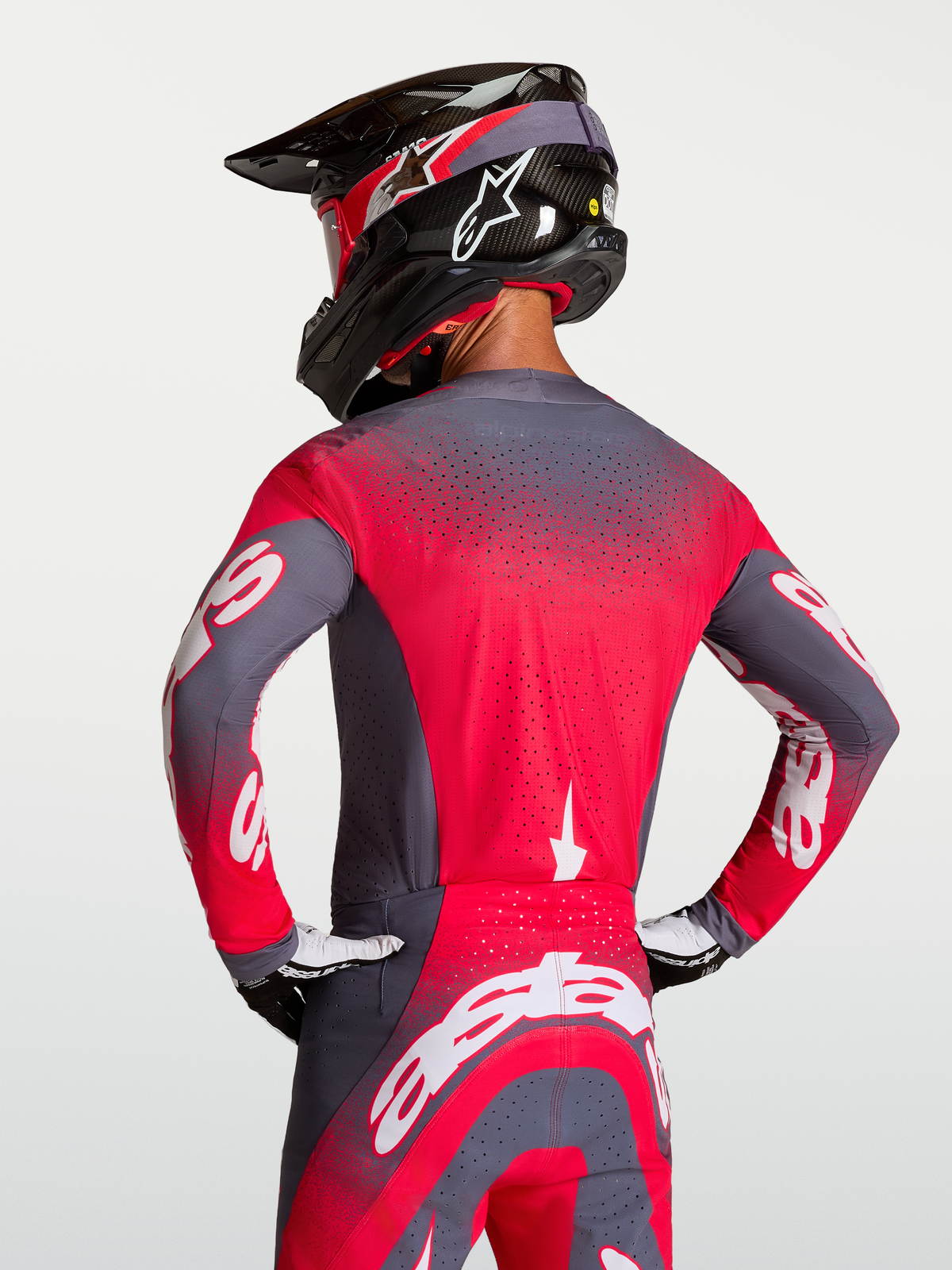 Alpinestars Koszulka Supertech Hiten AFD, koszulka motocrossowa na zawodniku, szara i neonowa czerwona, wentylacja Stretchnet, laserowe perforacje, profesjonalne dopasowanie wyścigowe