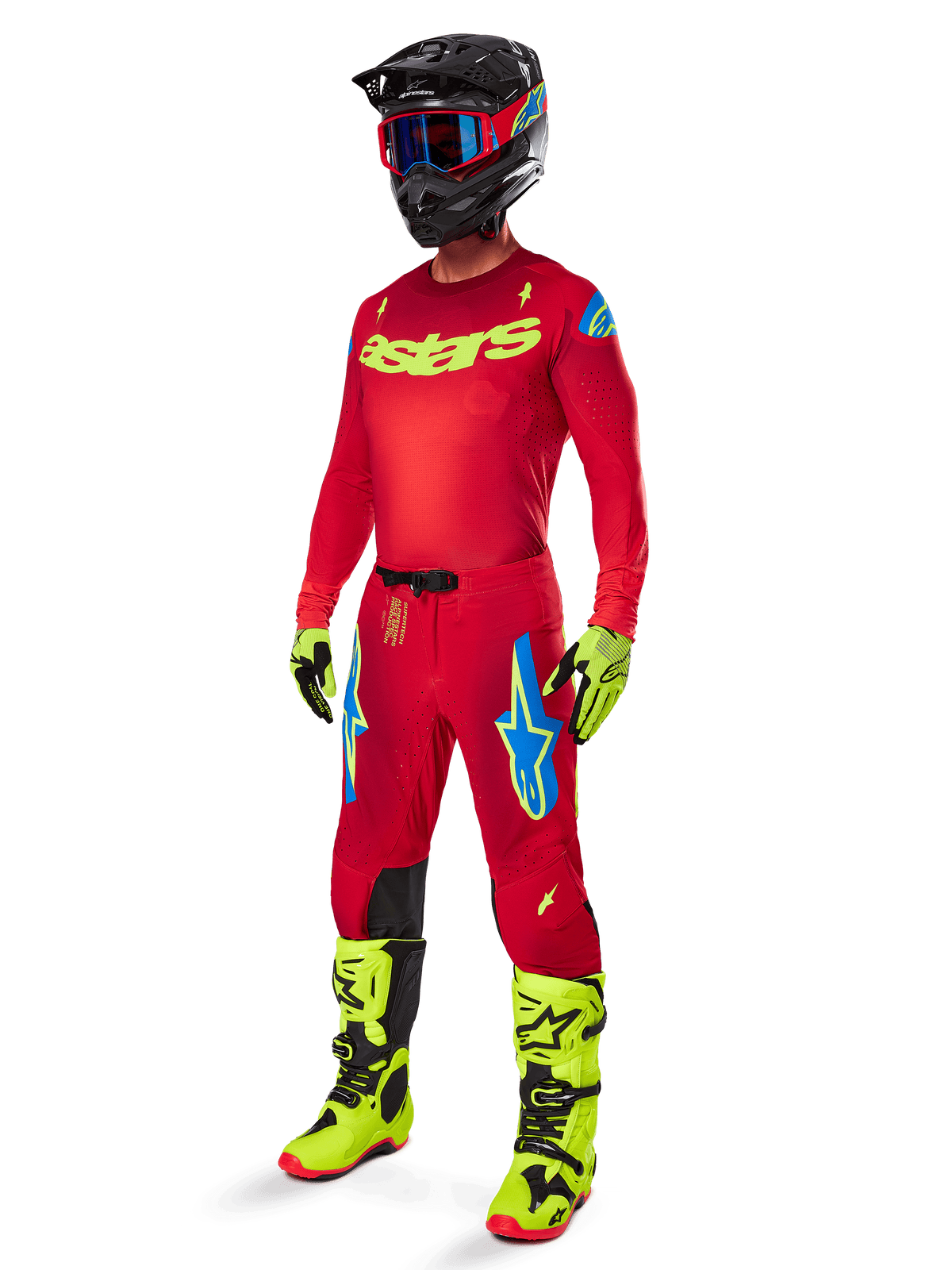 Alpinestars 2025 Supertech Maker Gear Set, complete motocross racing outfit, red jersey and pants with yellow and blue accents, neon yellow boots and gloves, black helmet with blue goggles, professional high-performance gear for off-road racing
