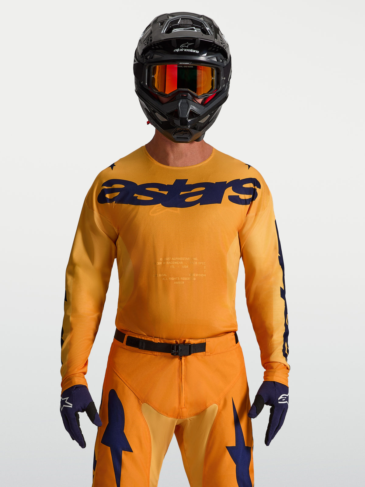 Koszulka Racer Amber Alpinestars, męska koszulka motocrossowa, pomarańczowa i ciemnoniebieska, logo Astars na piersi.
