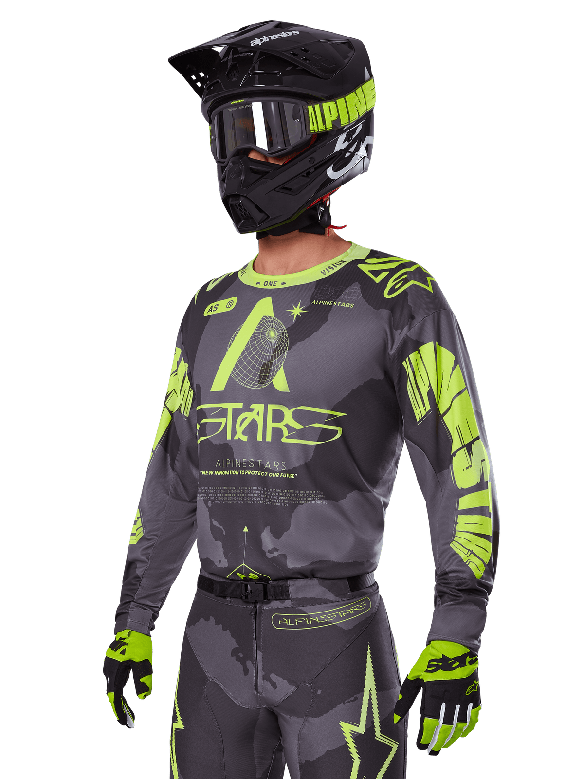 Zestaw Racer Hollow 2025 Alpinestars, koszulka i spodnie motocrossowe w kolorze szarym i neonowym żółtym, zestawiony z czarnym kaskiem, goglami i rękawicami, wyrazisty fluorescencyjny żółty branding Alpinestars i grafiki gwiazd na wzorzystym szarym tle, profesjonalny wygląd wyścigowy off-road