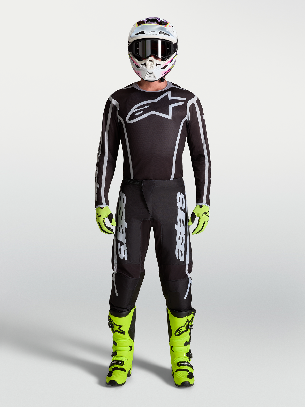 Koszulka Alpinestars Fluid Apex V2 i Fluid Apex V2 Gear Set, męski strój motocrossowy, czarny, srebrny i jaskrawożółty.