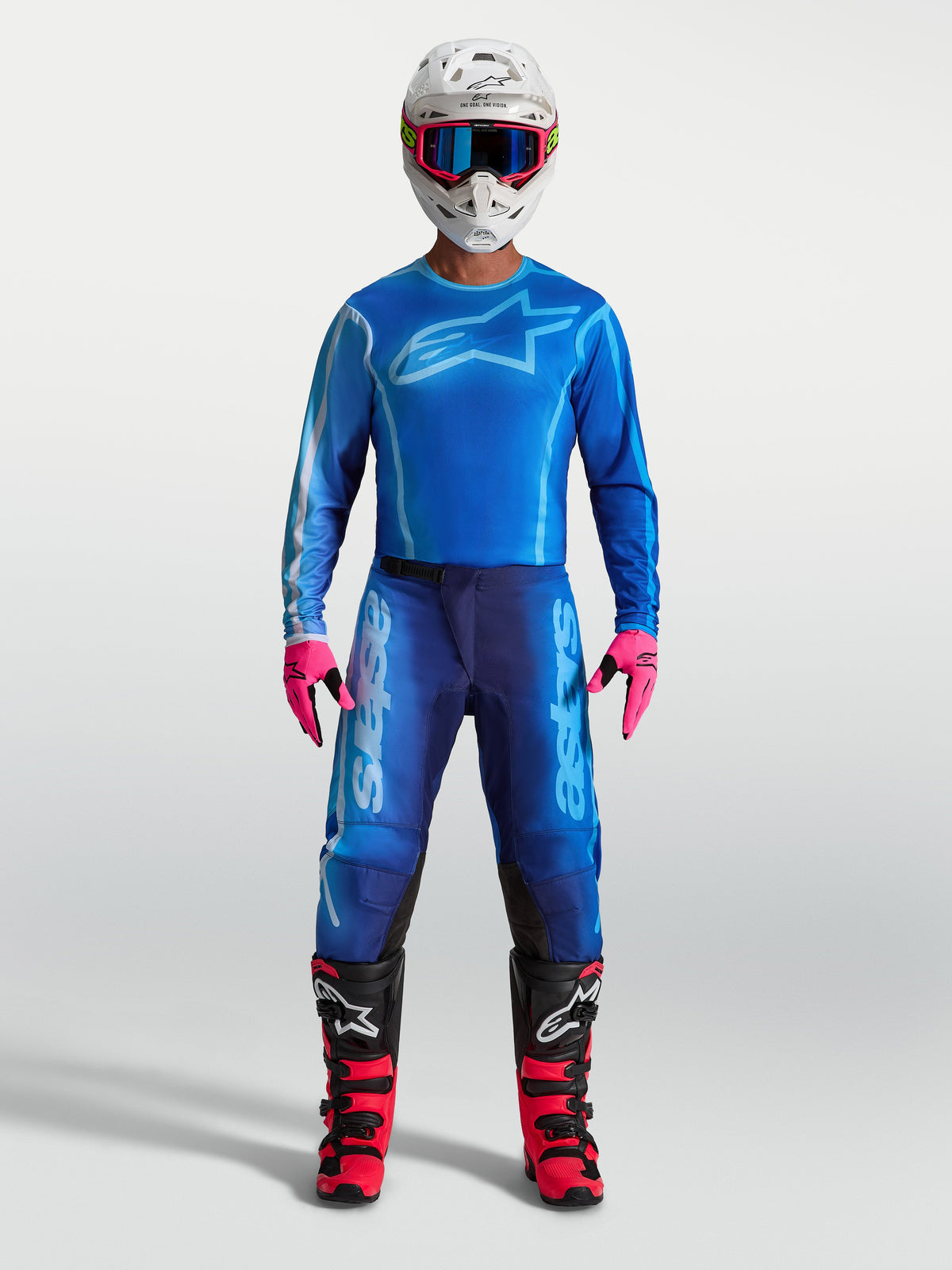 Alpinestars Koszulka Fluid Kepler i Fluid Kepler Gear Set, męski niebieski zestaw motocrossowy z różowymi akcentami, oddychający materiał o sportowym kroju, odzież off-road.