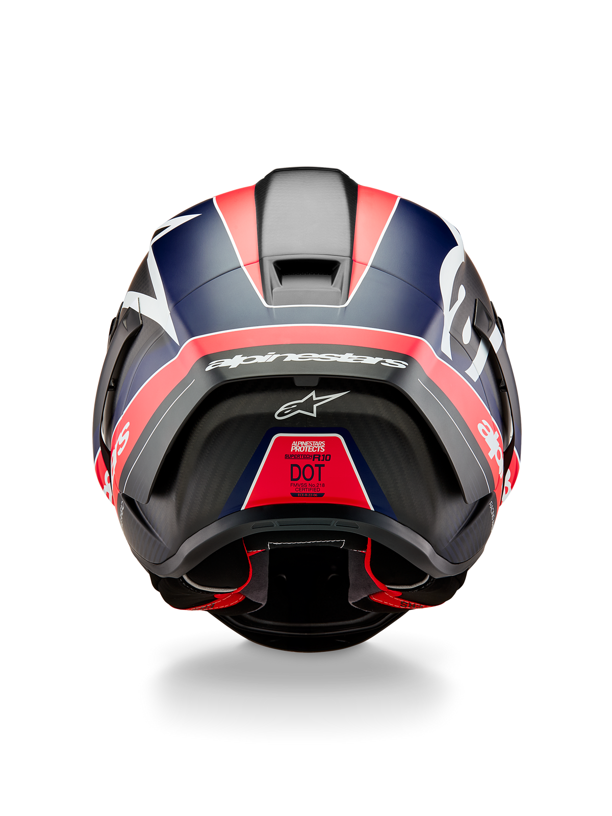 Alpinestars Supertech R10 Team Helmet, Rear View, Black Carbon with Red Fluo and Blue Matte accents, featuring an aerodynamic spoiler, bold white Alpinestars branding, and DOT certification label, professional motorsport gear