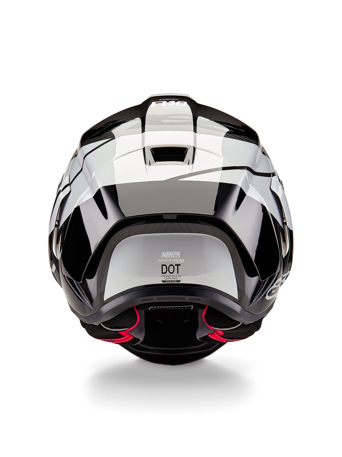 Alpinestars Supertech R10 Element Helmet, Rear View, Black Carbon Silver Black Glossy, featuring aerodynamic spoiler design, DOT certification label, and red interior padding accents, professional racing head protection